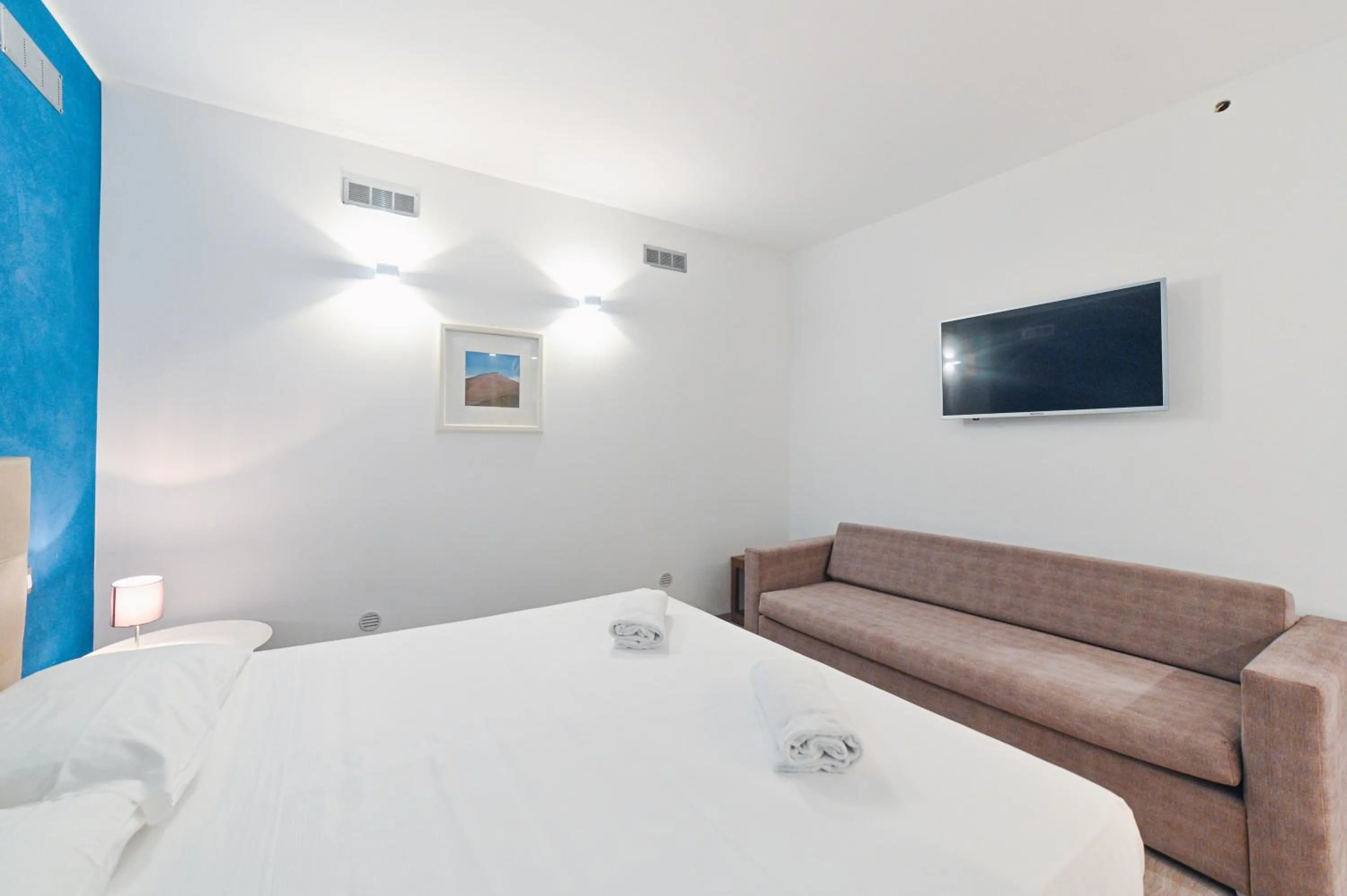 Bed in Hotel Baia Delle Sirene