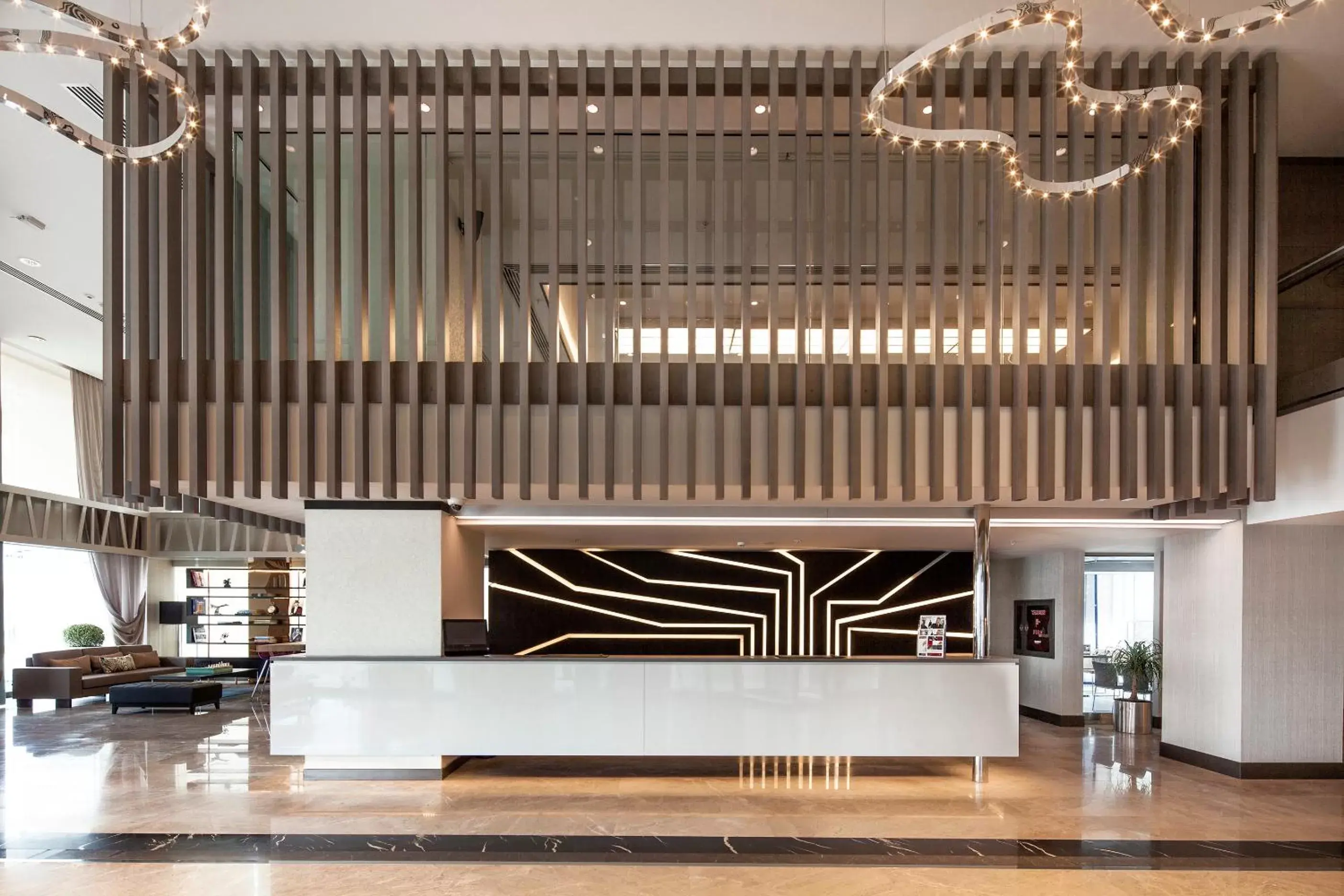 Lobby or reception in Ramada Hotel & Suites by Wyndham Izmir Kemalpasa