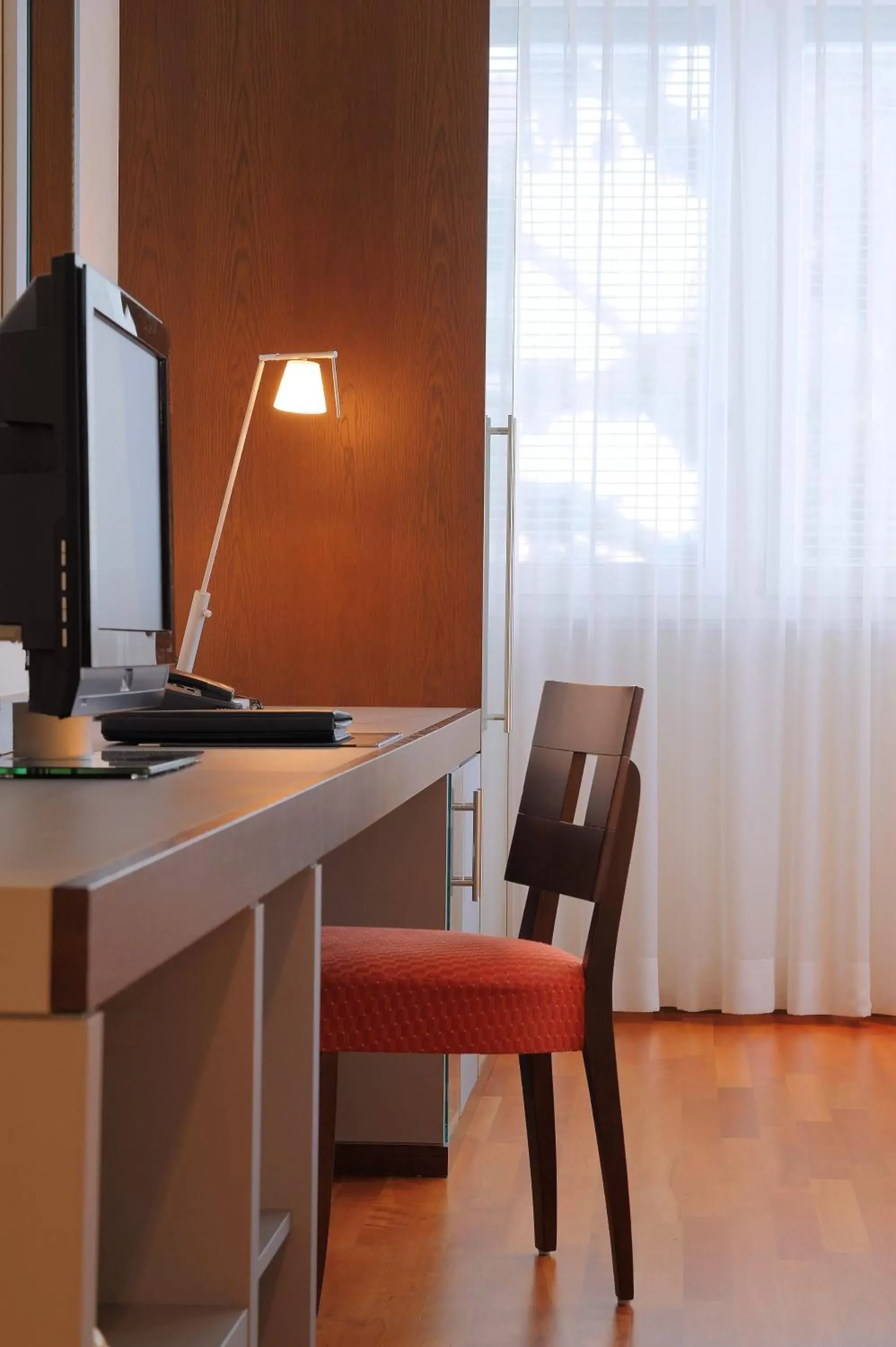 Photo of the whole room, TV/Entertainment Center in Radisson Blu Hotel, St. Gallen