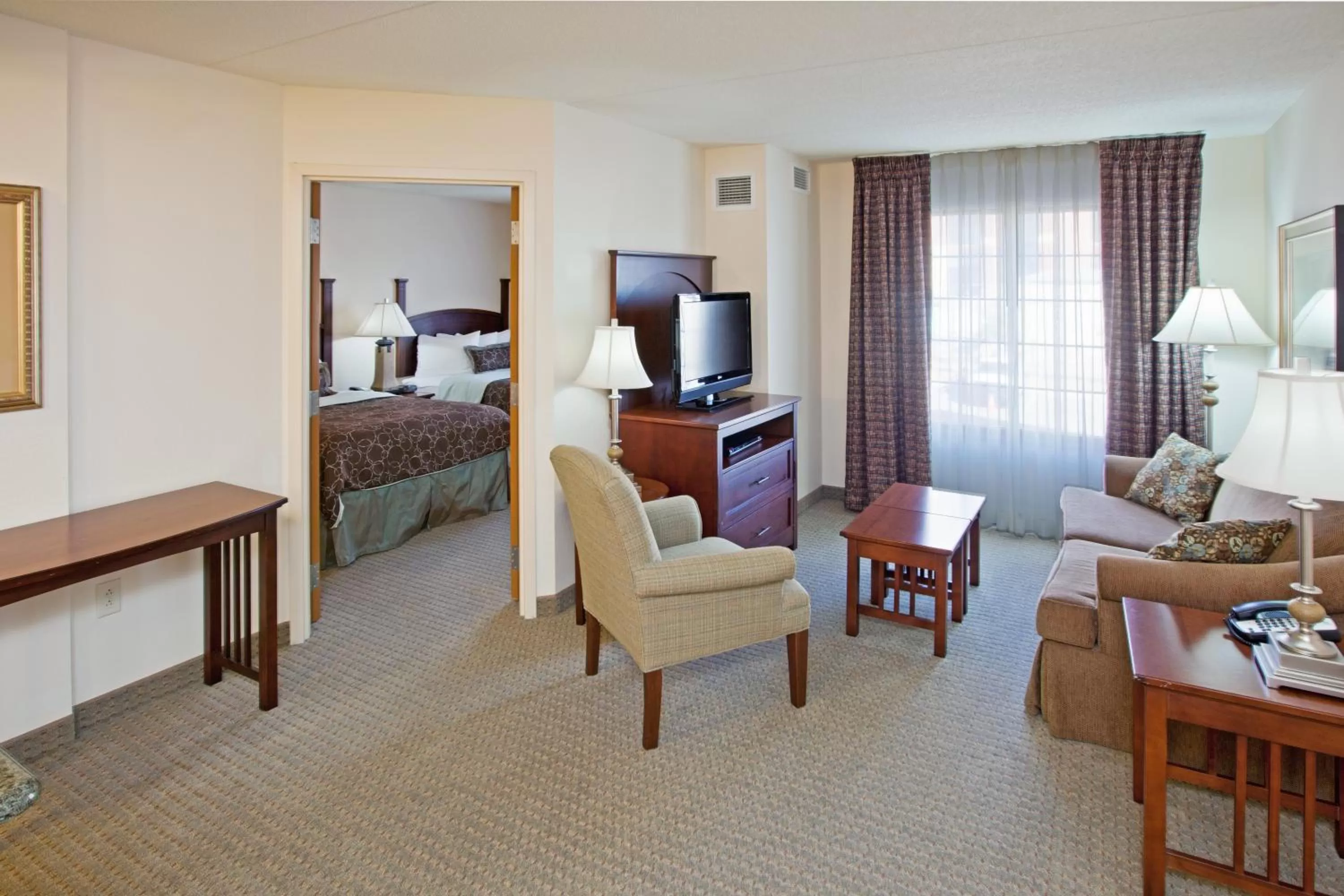 Living room, Bed in Staybridge Suites Indianapolis Downtown-Convention Center by IHG