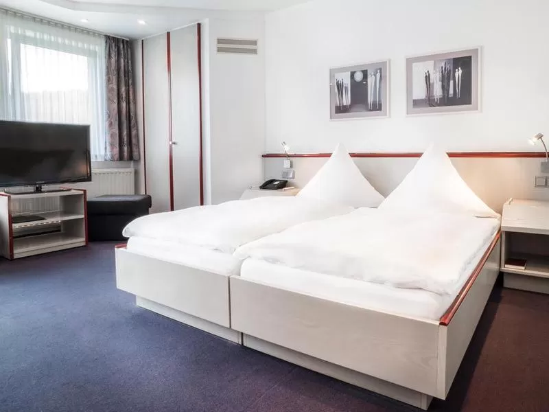 Bed in Hennedamm Hotel