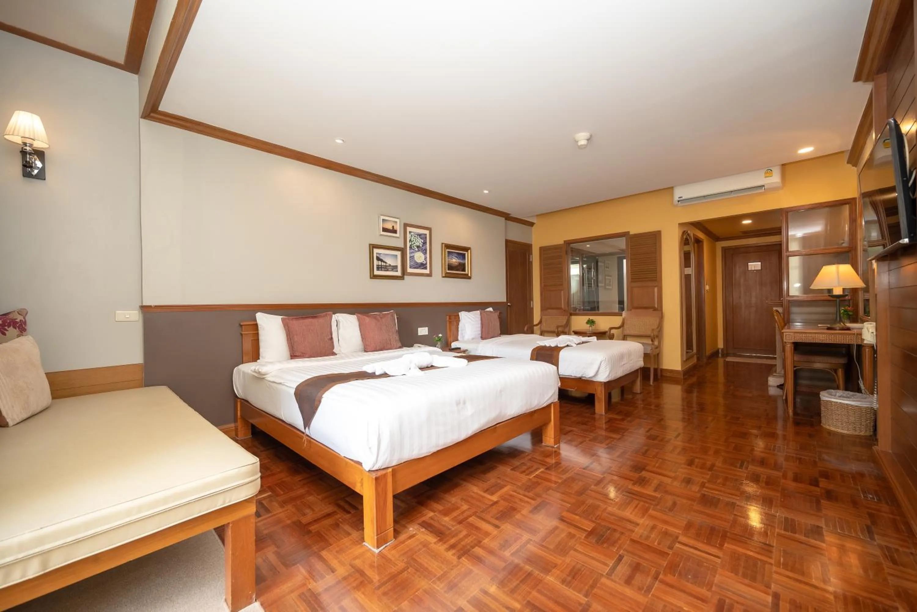 Bed in Comsaed River Kwai Resort