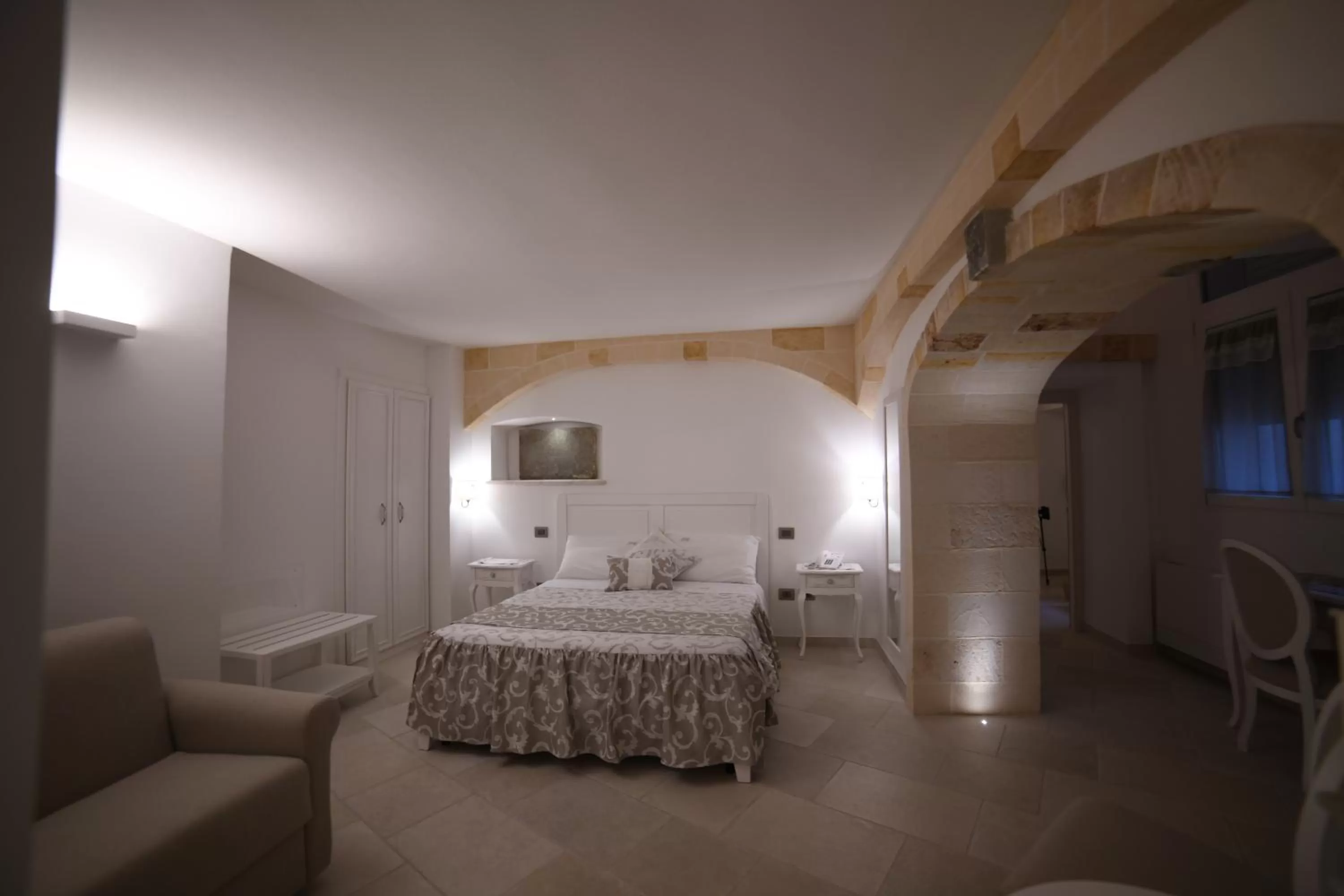 Bed in PLAZACARRISI HOTEL & SPA