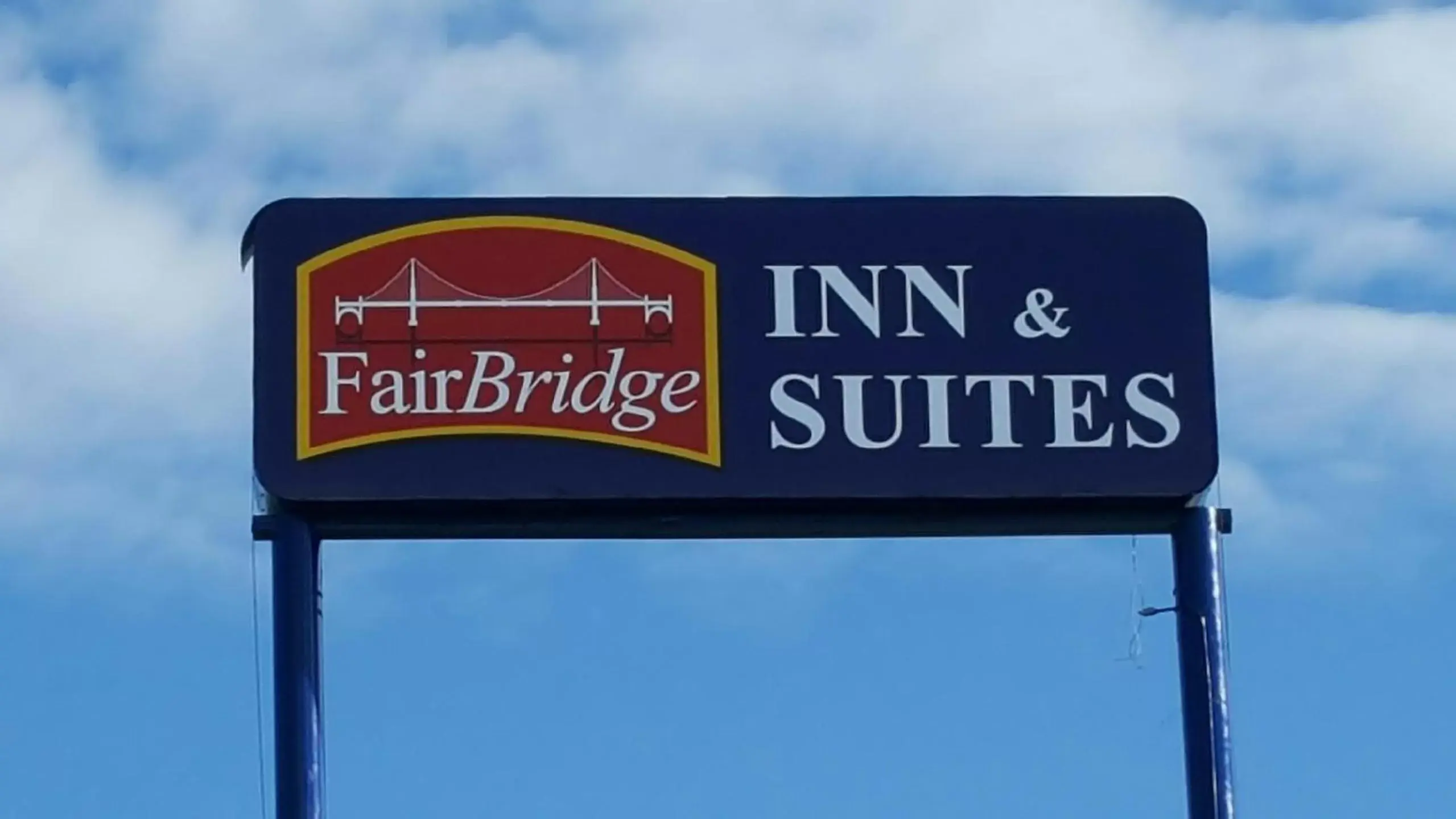 Property logo or sign, Property Logo/Sign in FairBridge Extended Stay, a Kitchenette Hotel