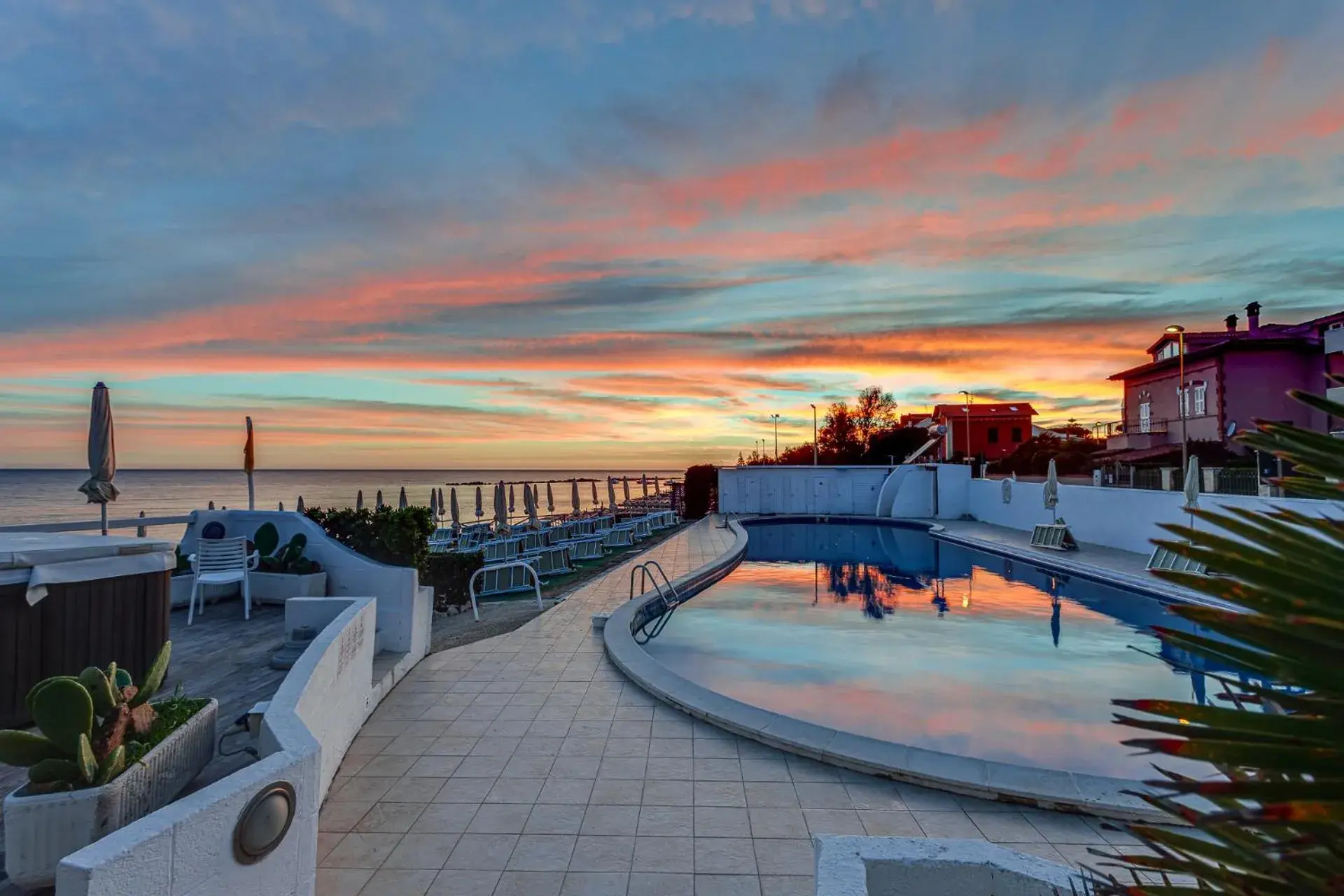 Sunset, Swimming Pool in Hotel Cavalluccio Marino