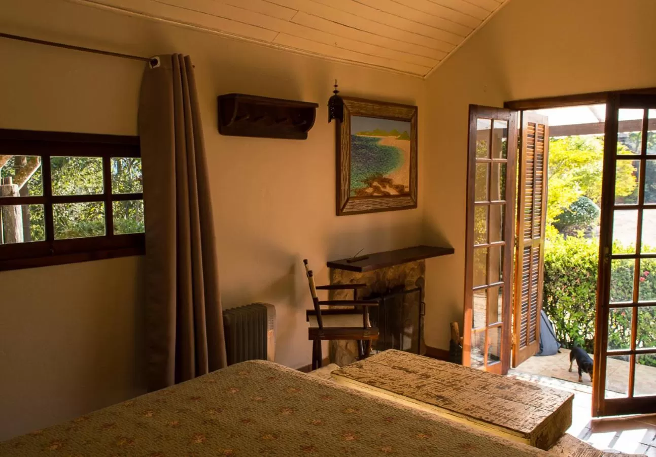 Balcony/Terrace, Bed in Pousada Vila Santa Barbara