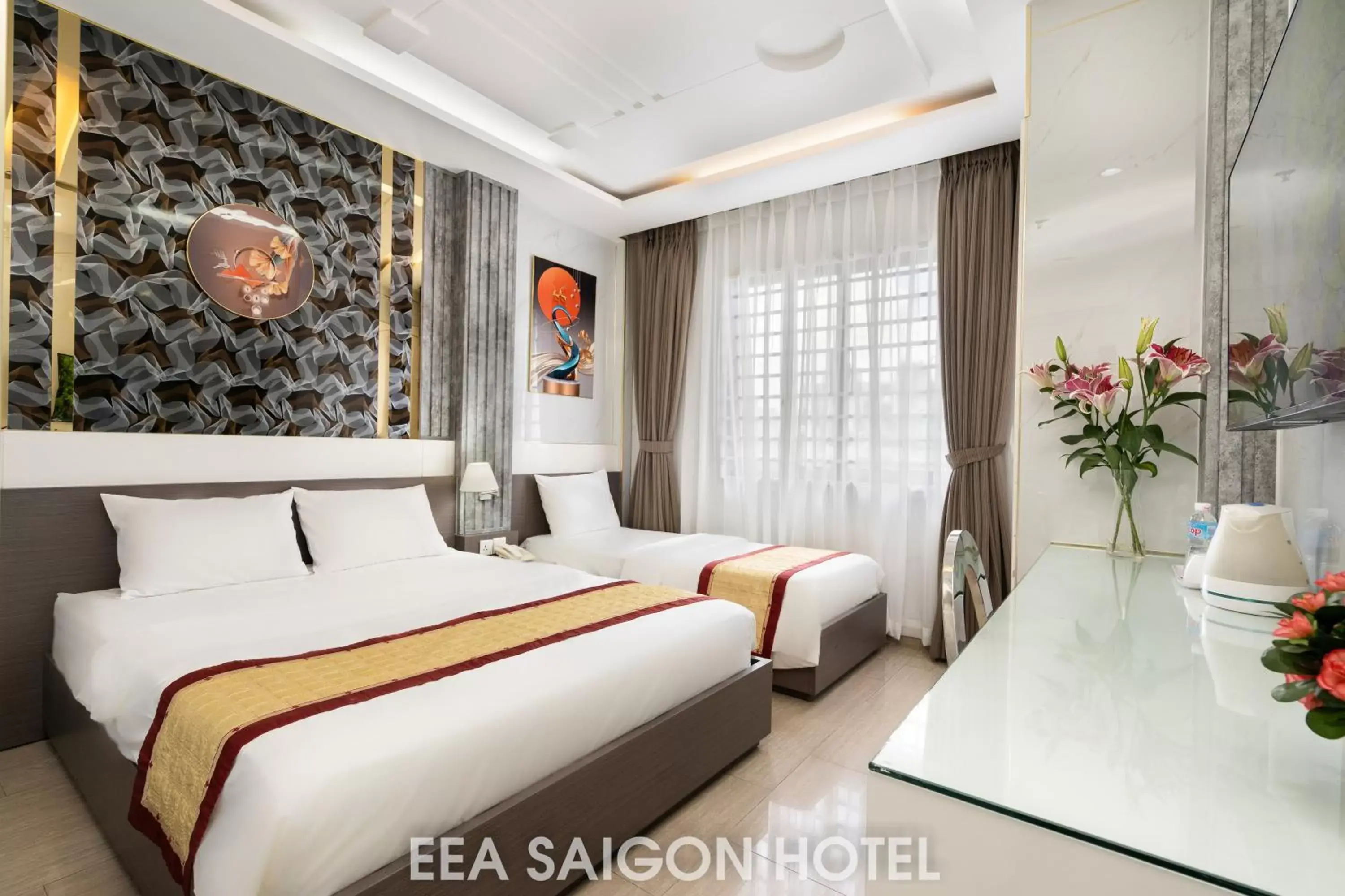 Bed in EEA Central Saigon Hotel