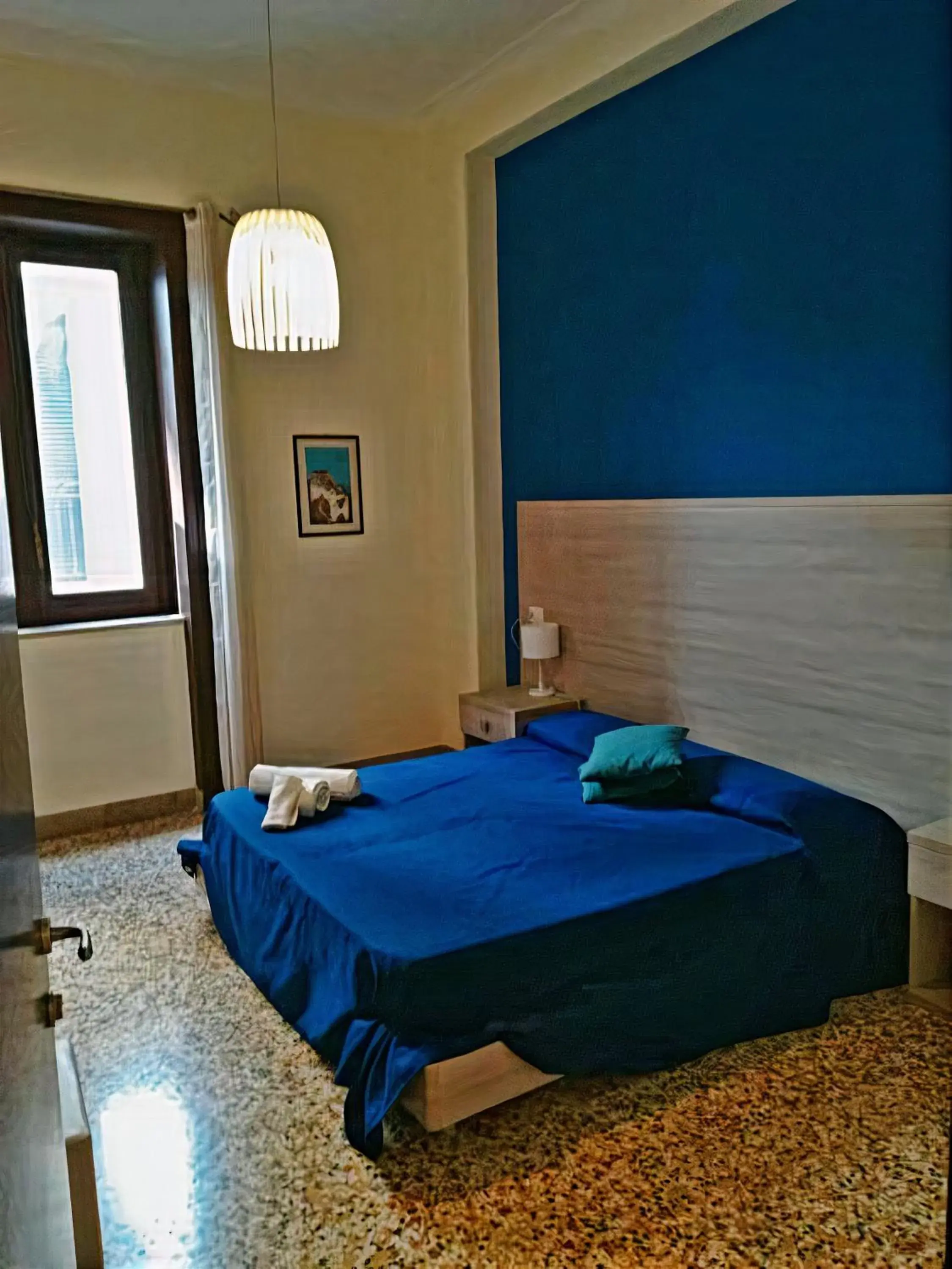 Bed in Il Quadrifoglio Room& Suite