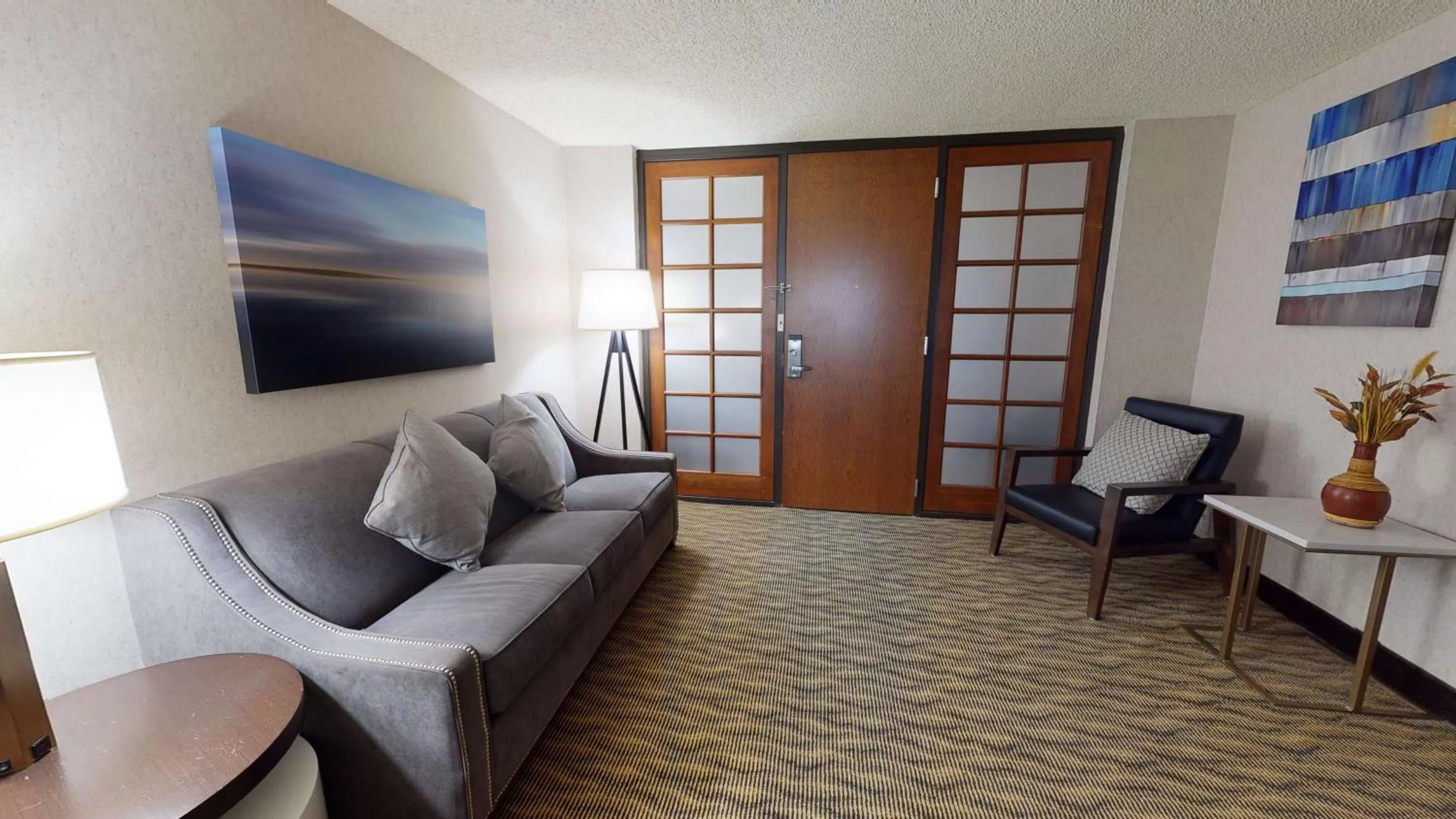 Living room in Embassy Suites by Hilton Oklahoma City Will Rogers Airport
