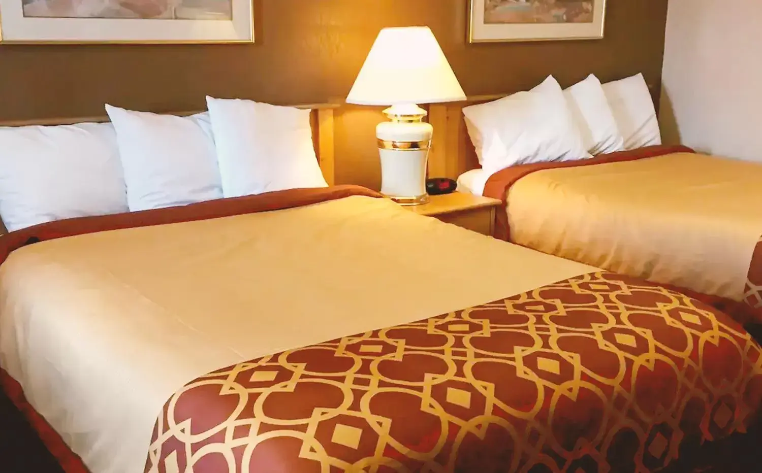 Bed in Coratel Inn & Suites by Jasper Mankato