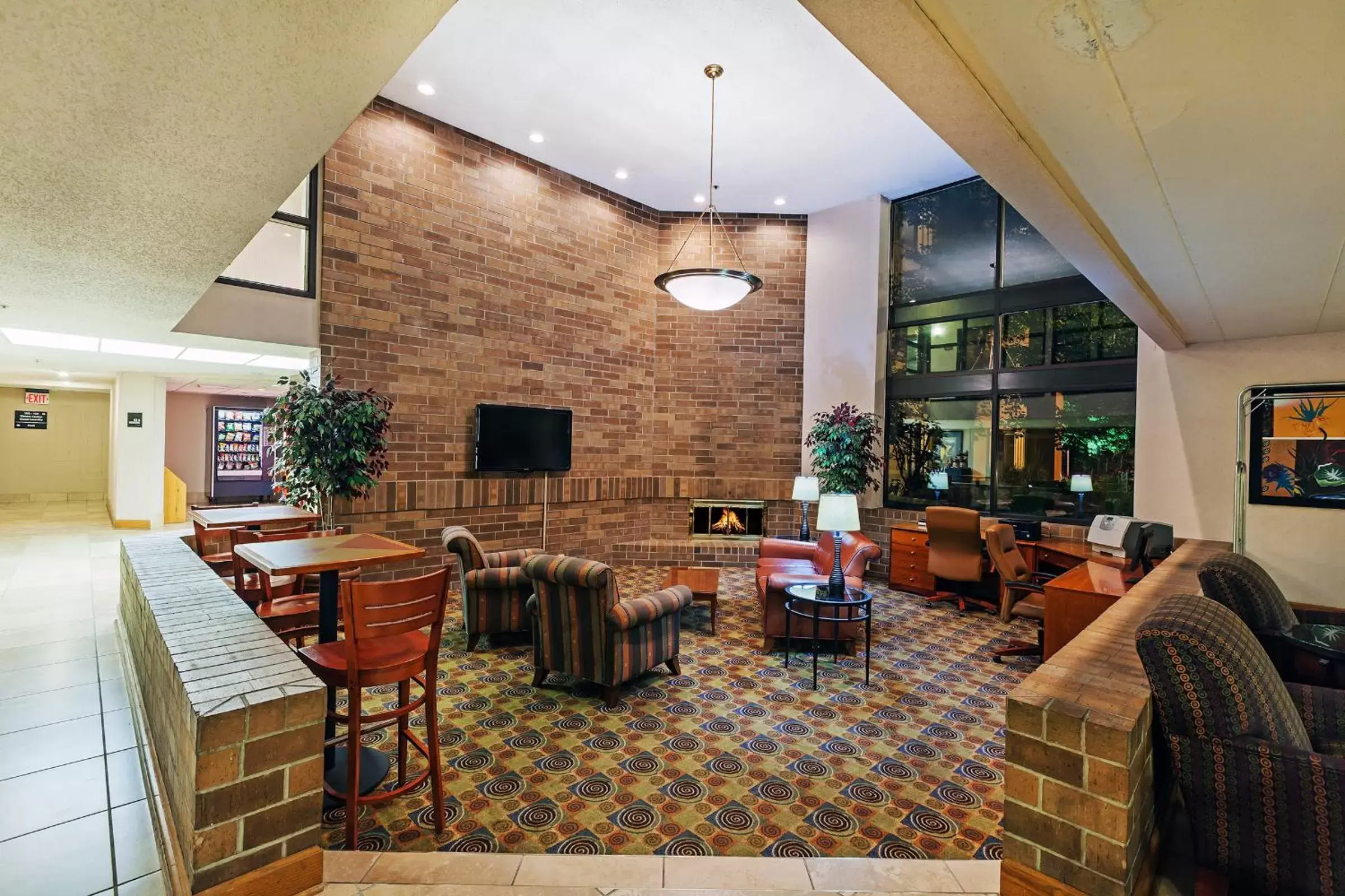 Lobby or reception, Restaurant/Places to Eat in AmericInn by Wyndham Omaha