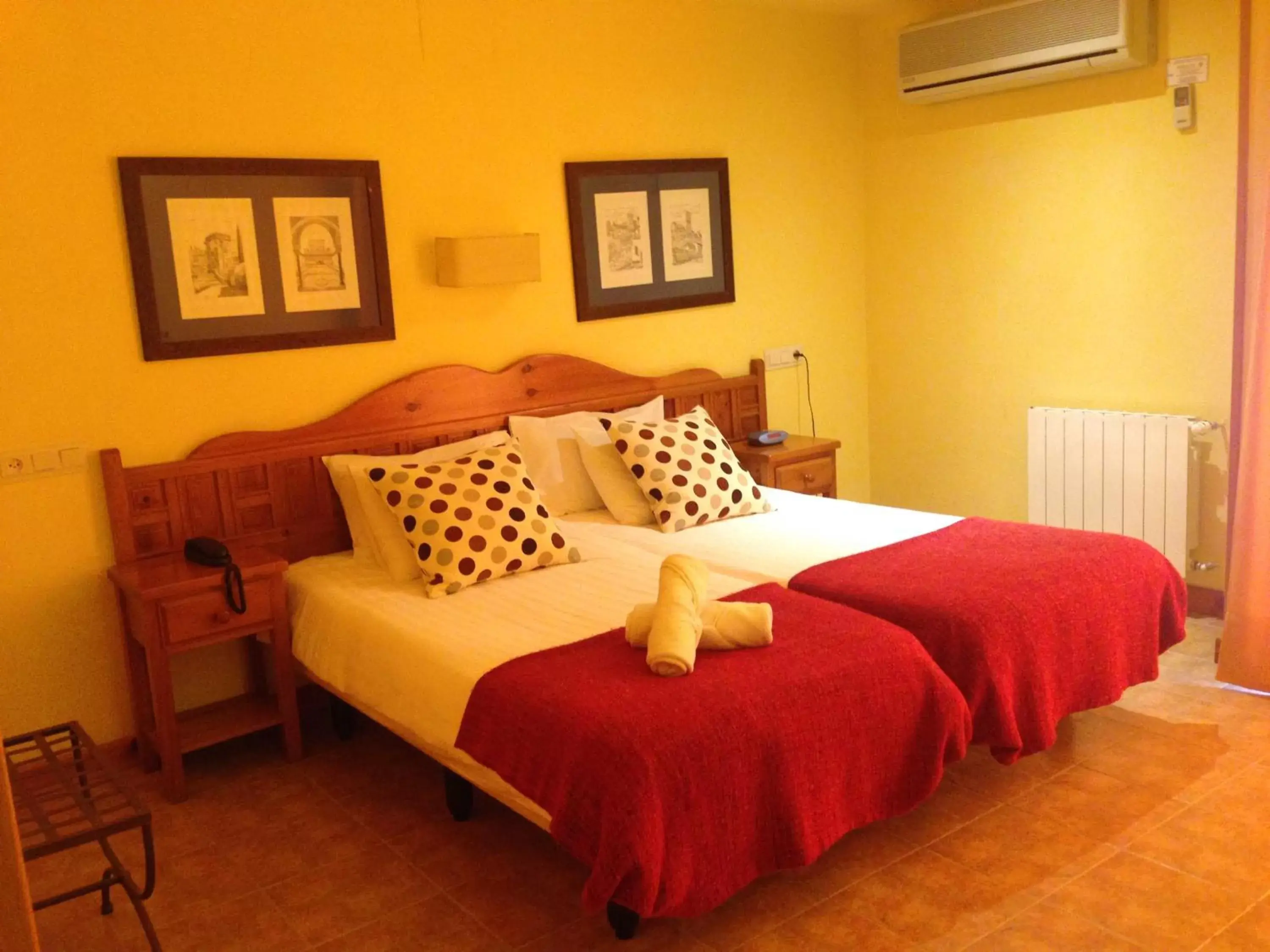 Bed in Hotel Alcadima