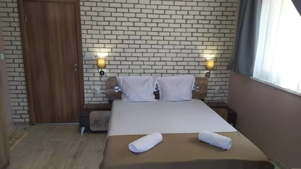 Bed in Family Hotel Malibu