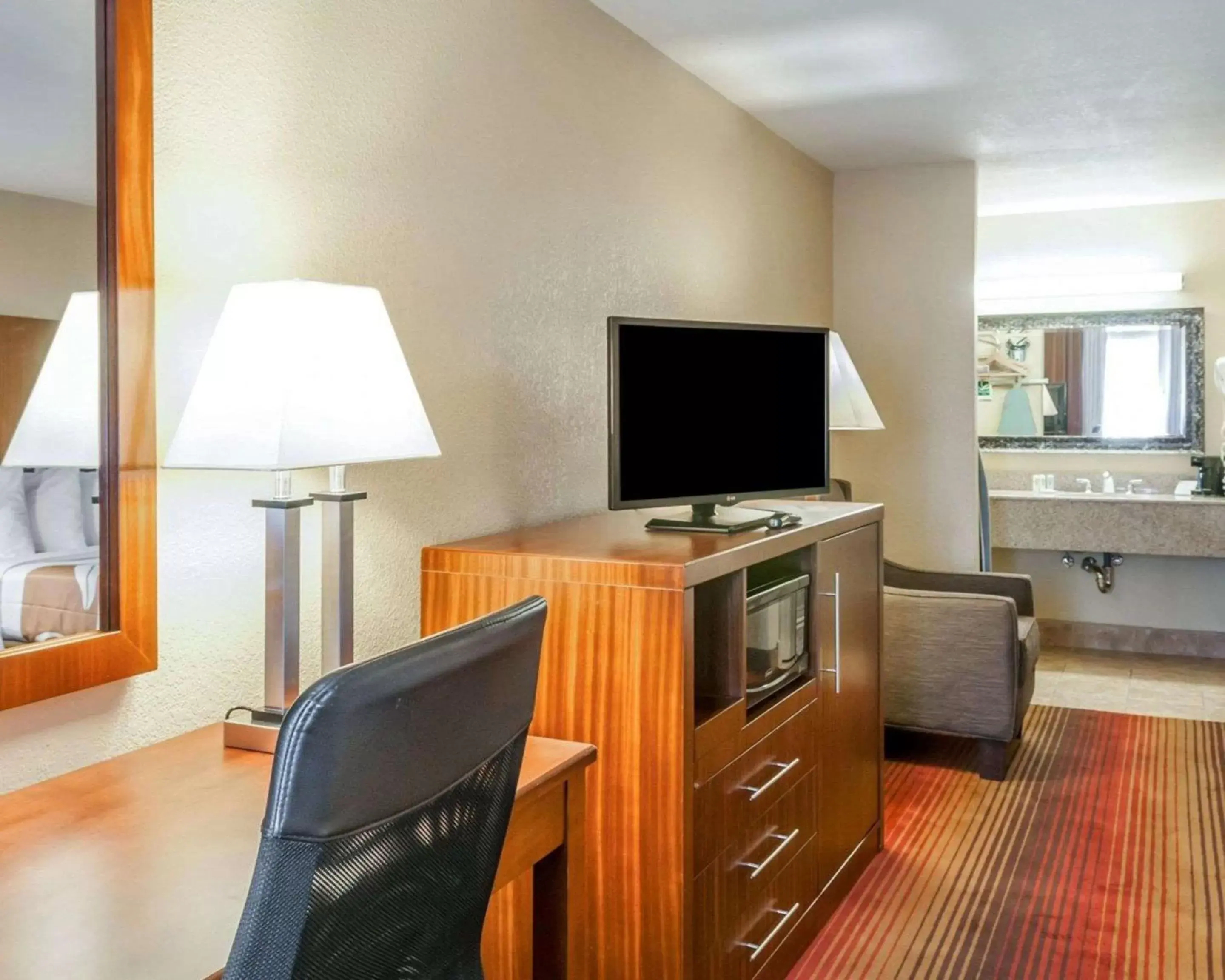 Photo of the whole room, TV/Entertainment Center in Quality Inn & Suites Albuquerque West