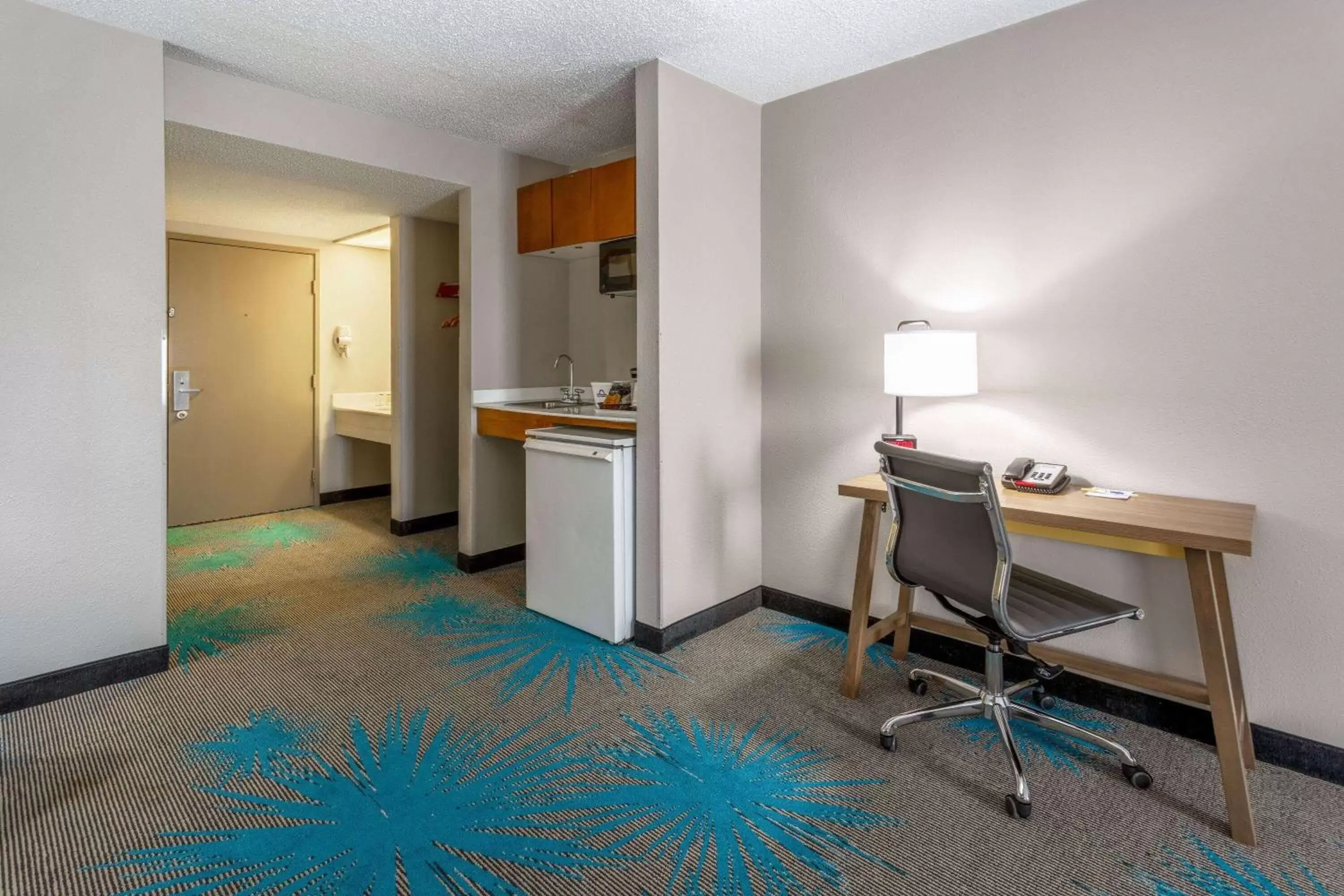 Bed in Days Inn & Suites by Wyndham Denver International Airport