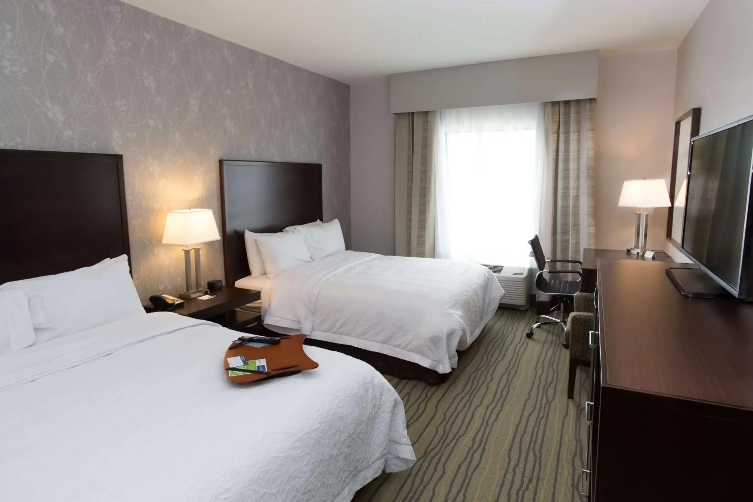 Bed, TV/Entertainment Center in Hampton Inn by Hilton Lloydminster