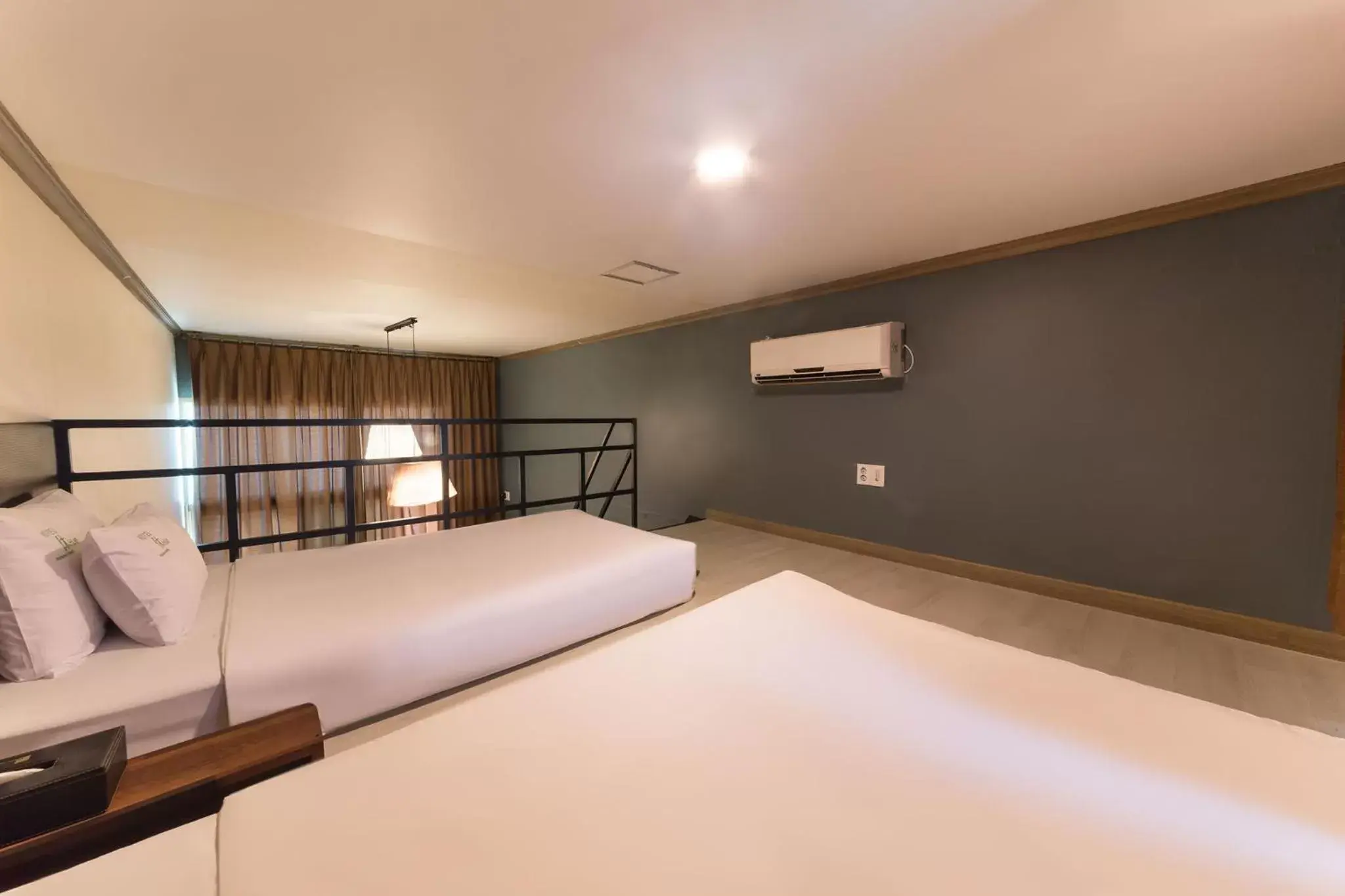Bed in Hotel Hue Loft