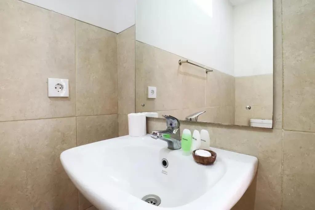 Bathroom in Avisara Villa & Suite