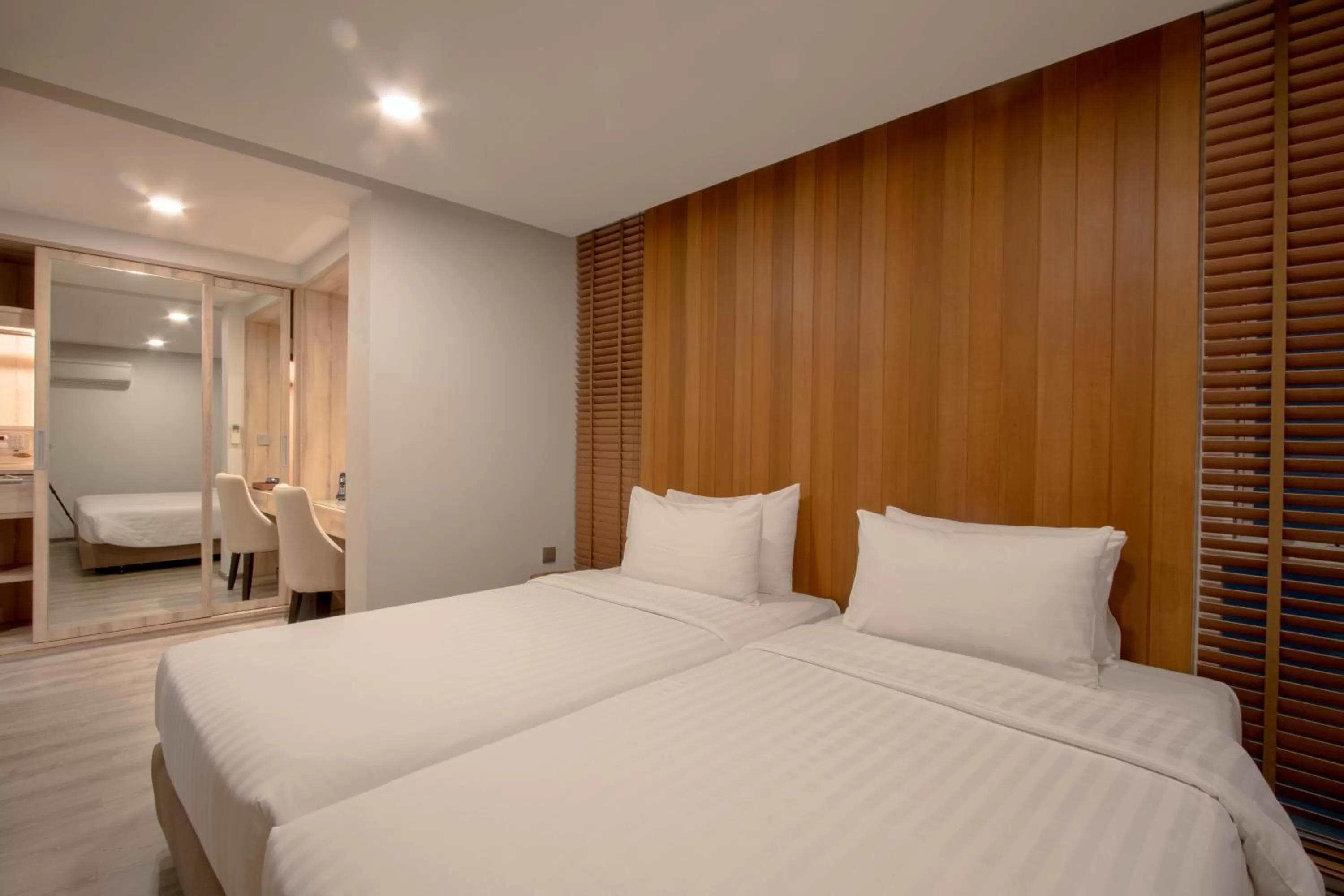 Bed in The Residence Rajtaevee Hotel