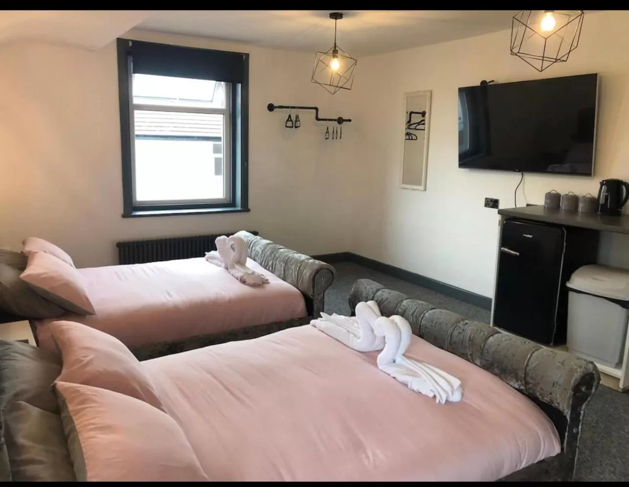 Bed in RESIDENCY LUXURY SEAFRONT HOTEL