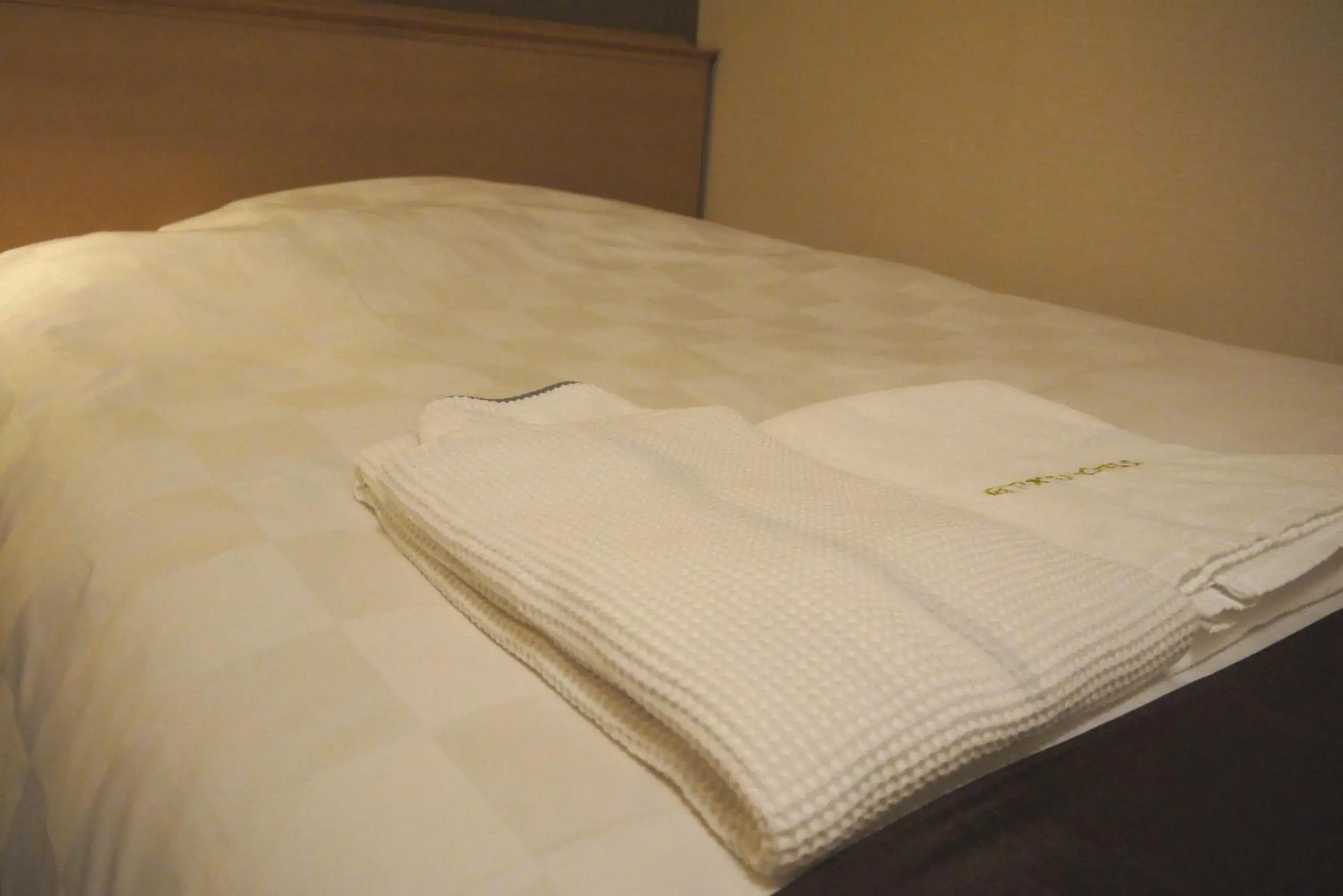 Bed in Takamatsu Tokyu Rei Hotel