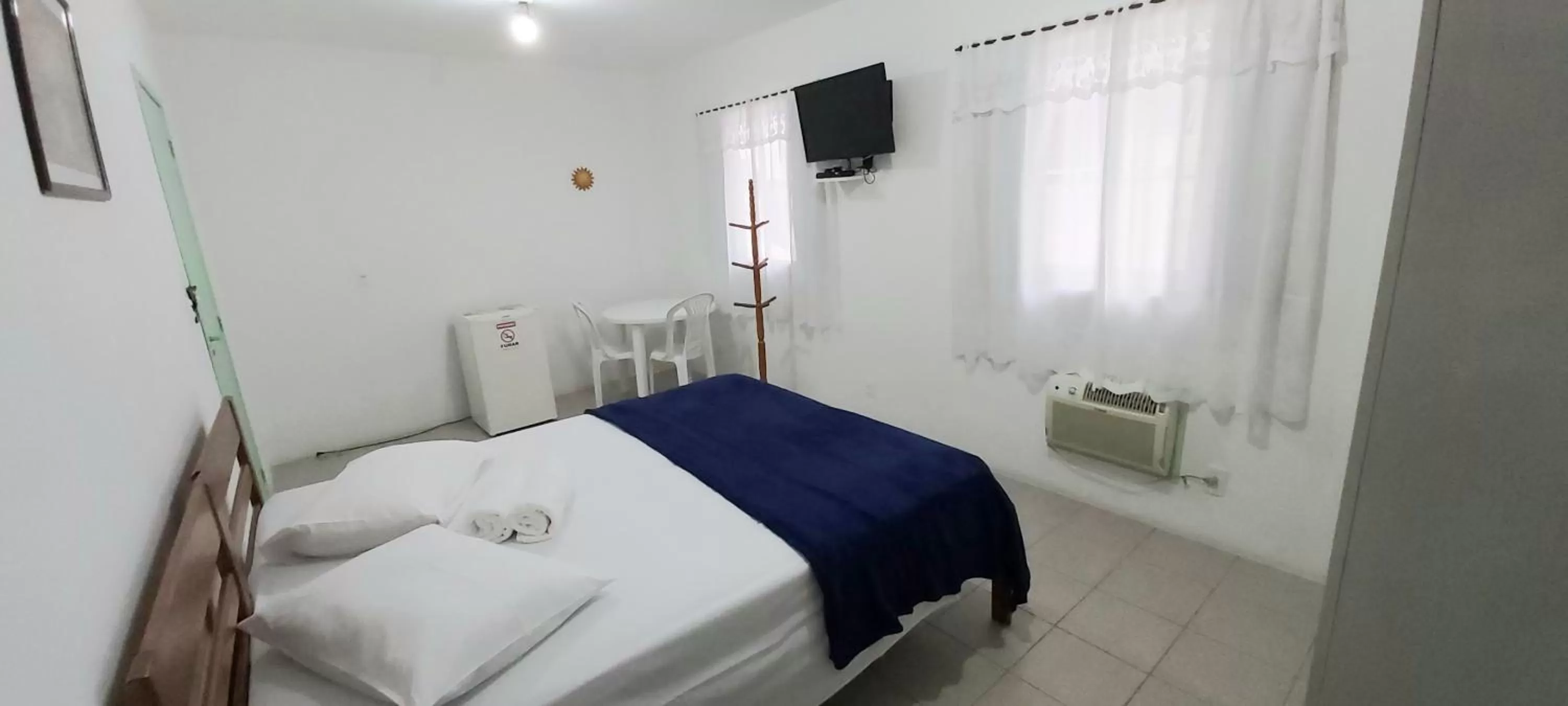 Bed in Pousada Milani