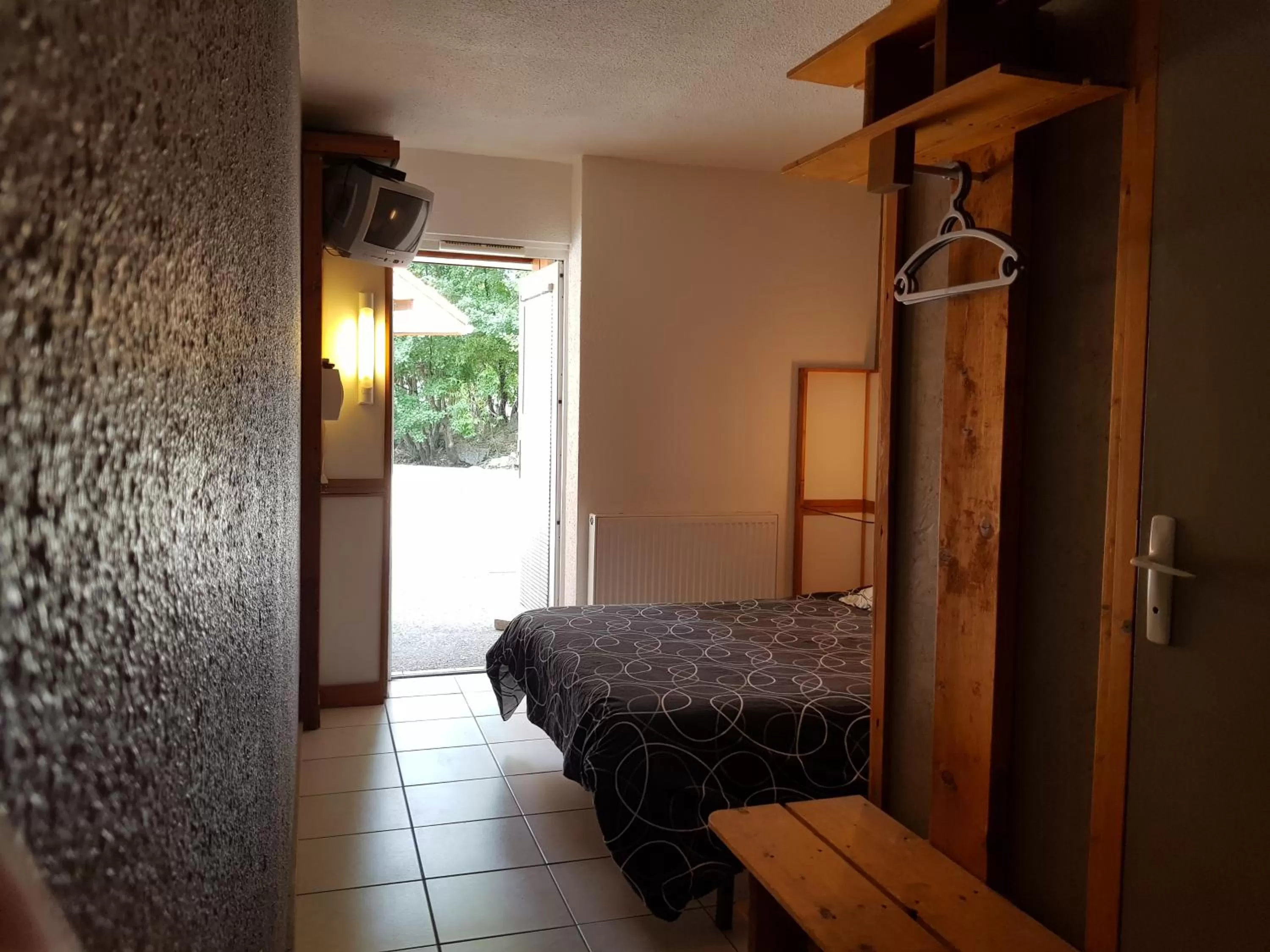 Bed in Hôtel Eco Logis Espace Bellevue