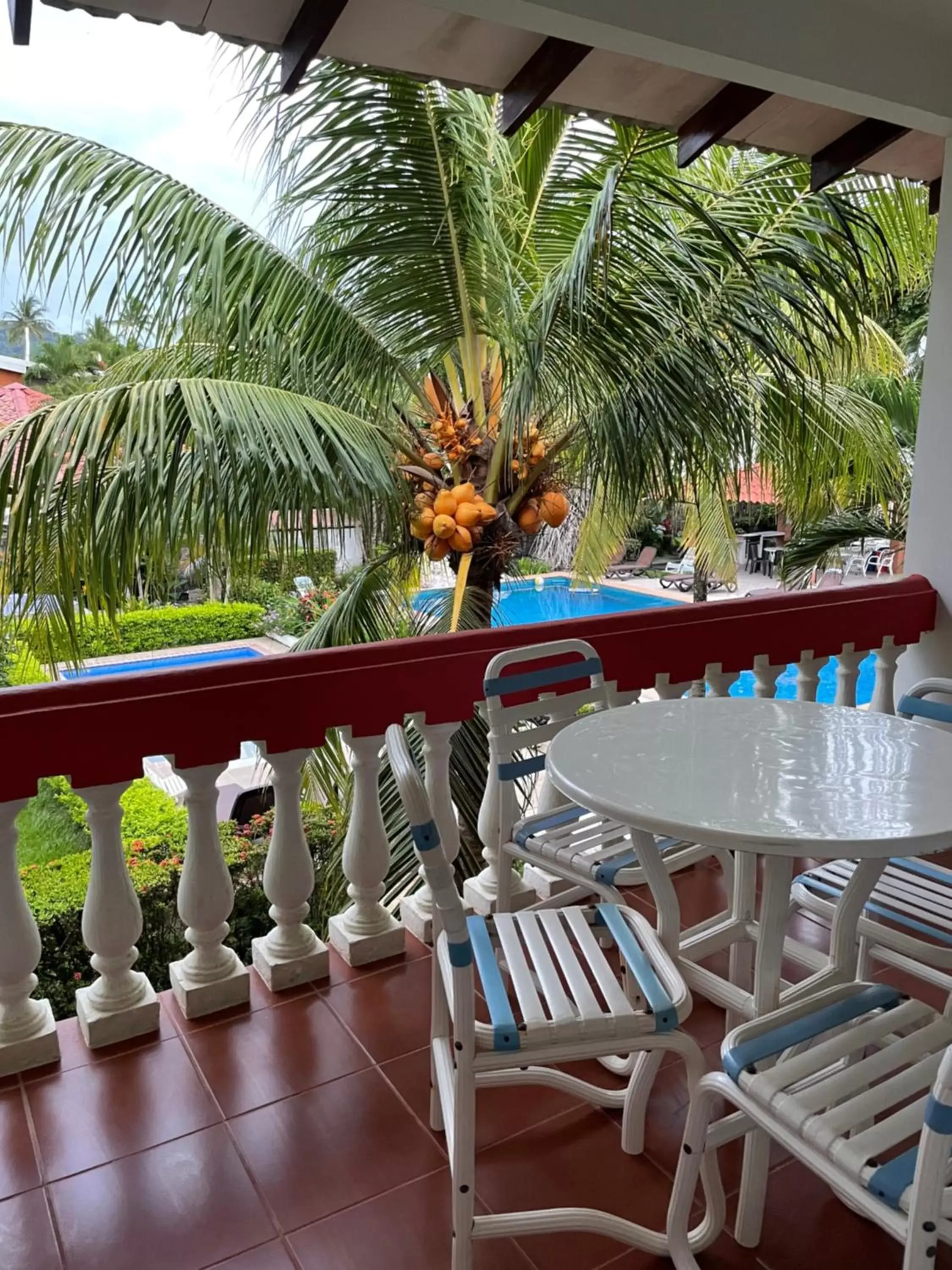 Balcony/Terrace, Pool View in Apartotel Flamboyant