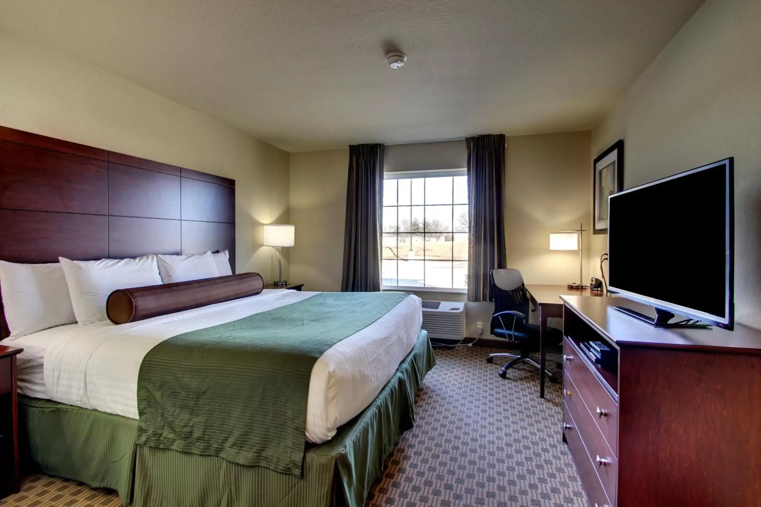 Photo of the whole room, TV/Entertainment Center in Cobblestone Inn & Suites - Carrington