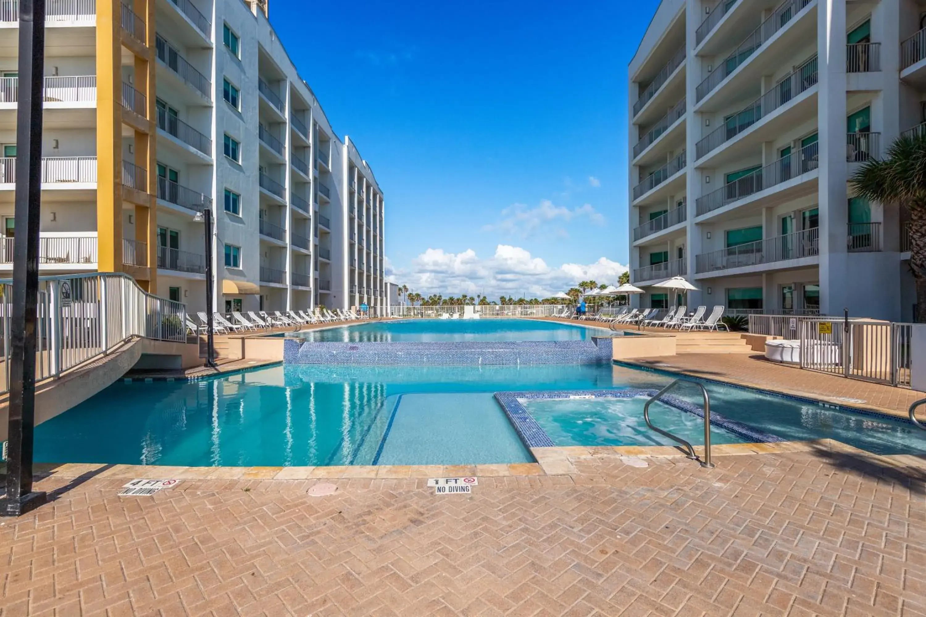 Swimming pool in Peninsula Island Resort & Spa - Beachfront Property at South Padre Island Swimming pool in Peninsula Island Resort & Spa - Beachfront Property at South Padre Island