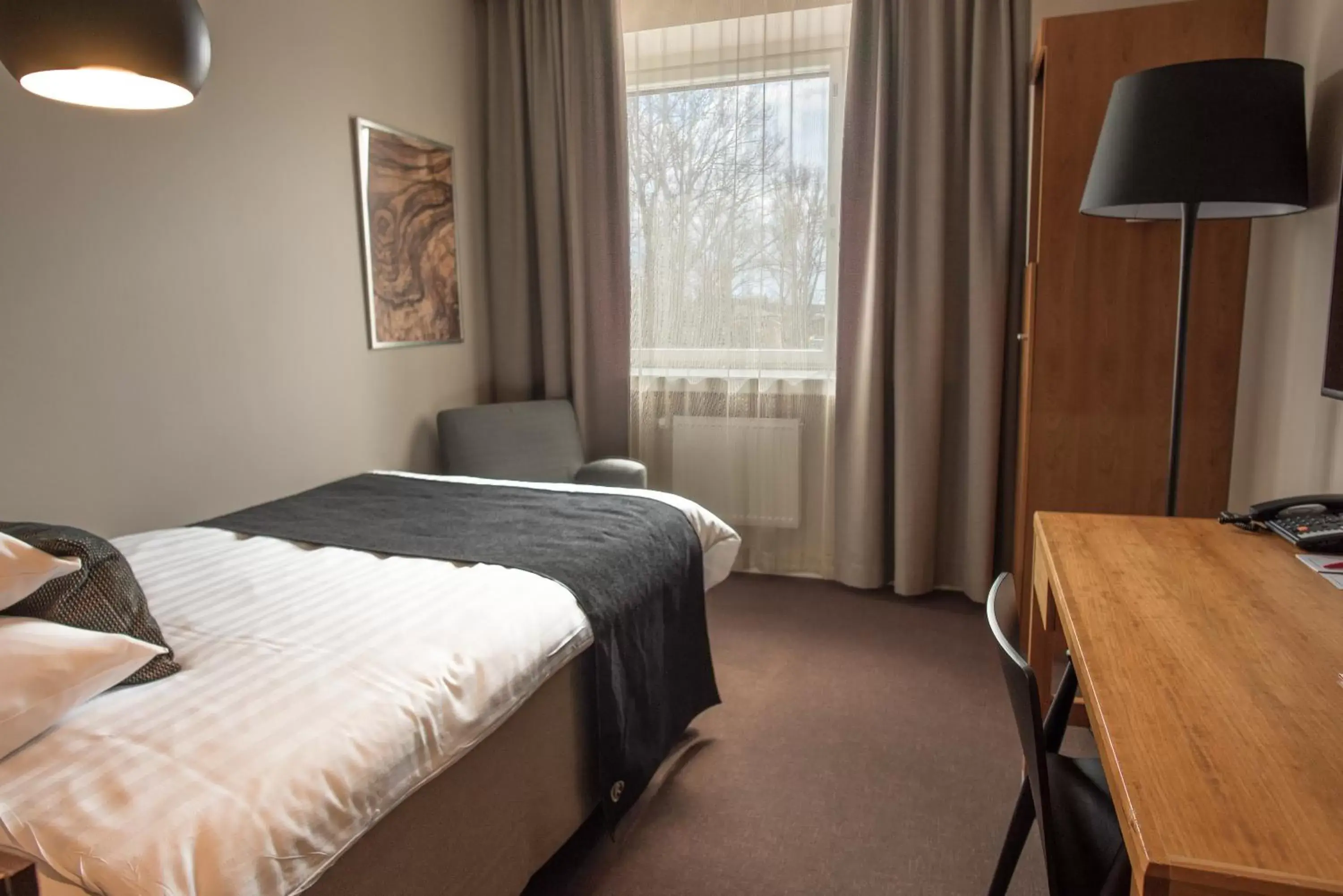 Photo of the whole room, Bed in Original Sokos Hotel Vaakuna Joensuu