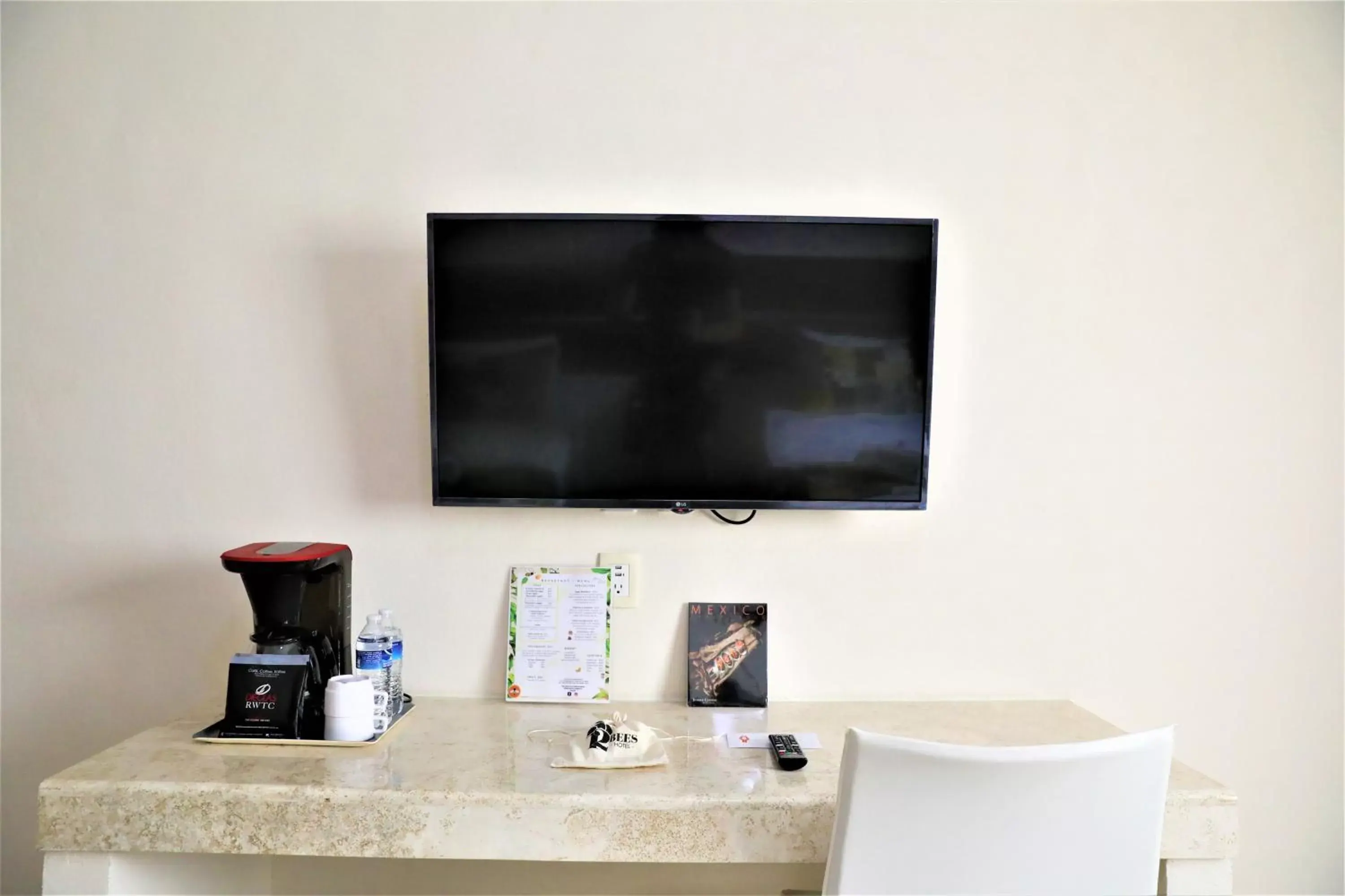 TV and multimedia, TV/Entertainment Center in Hotel 12 BEES by Kavia