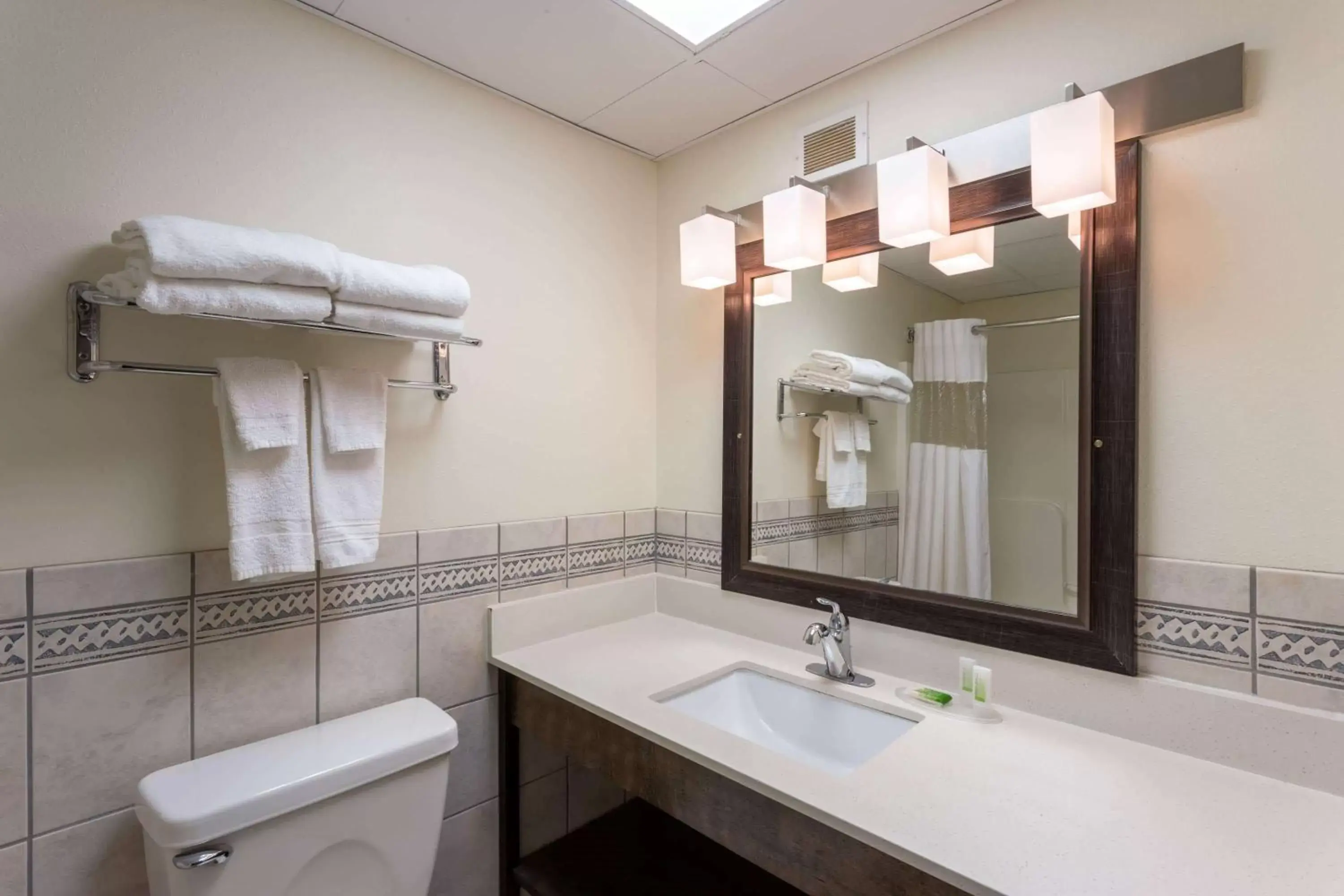 Bathroom in AmericInn by Wyndham Wausau