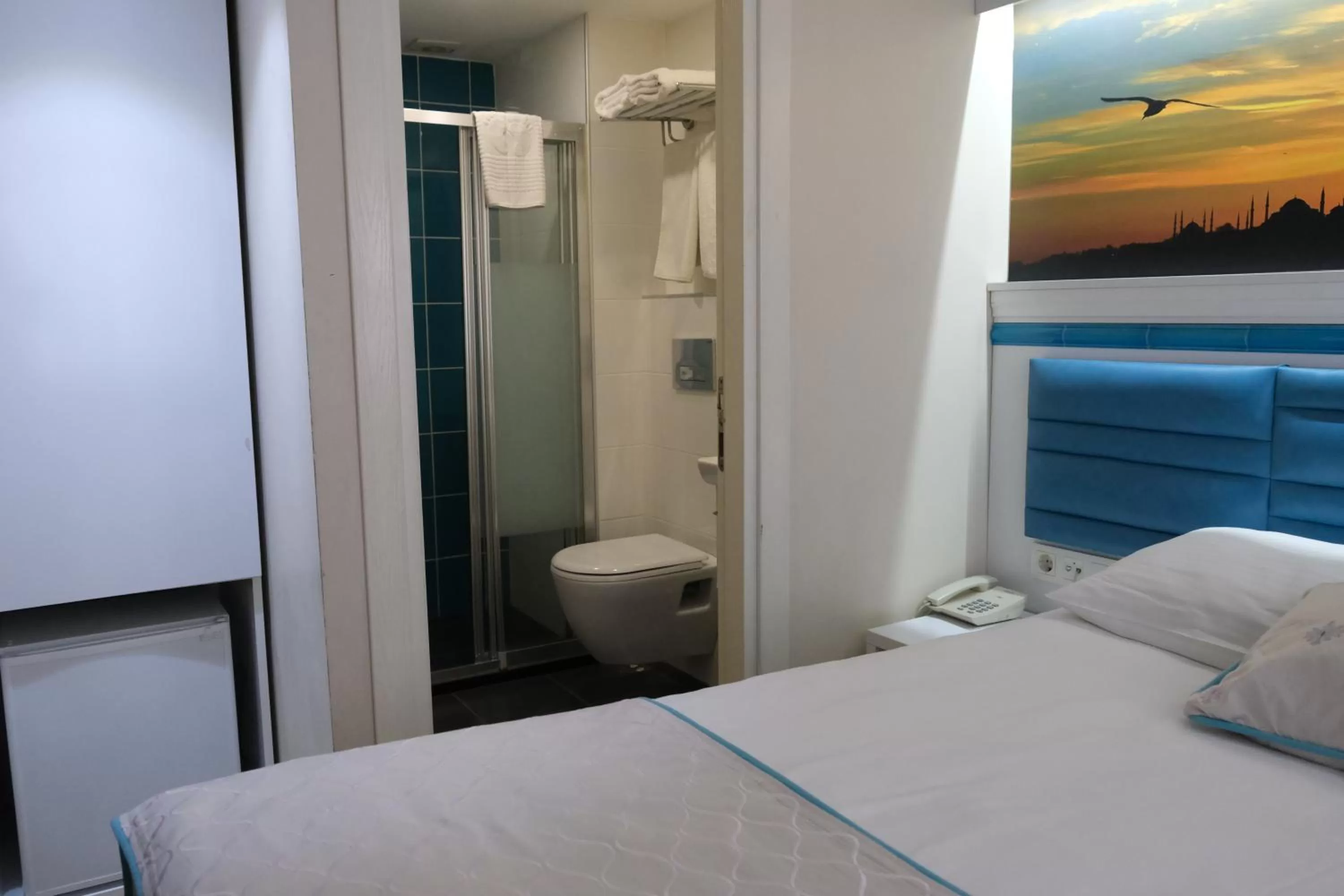 Toilet, Bed in Star Holiday Hotel