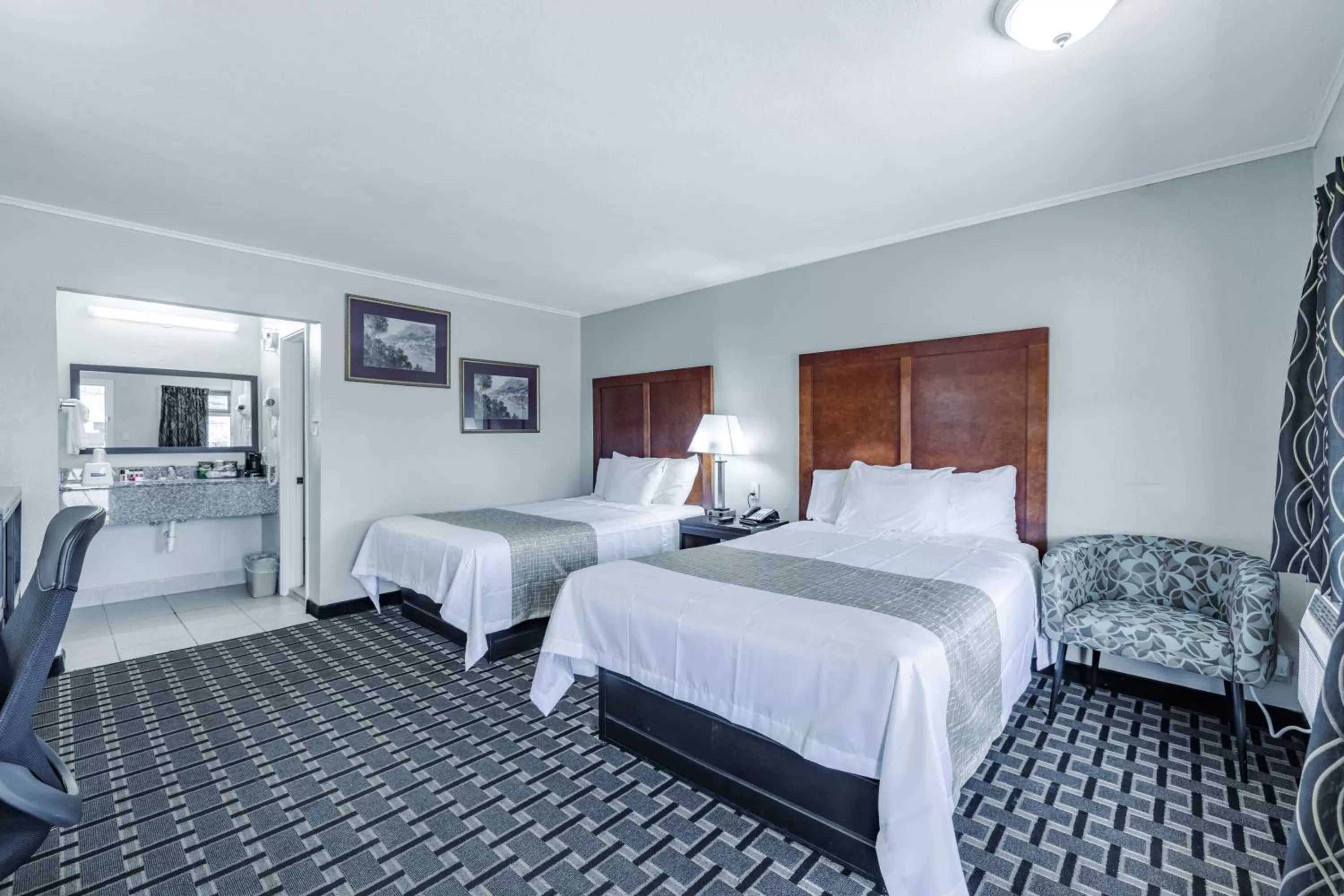 Bed in Travelodge by Wyndham Jackson I-40 Exit 82