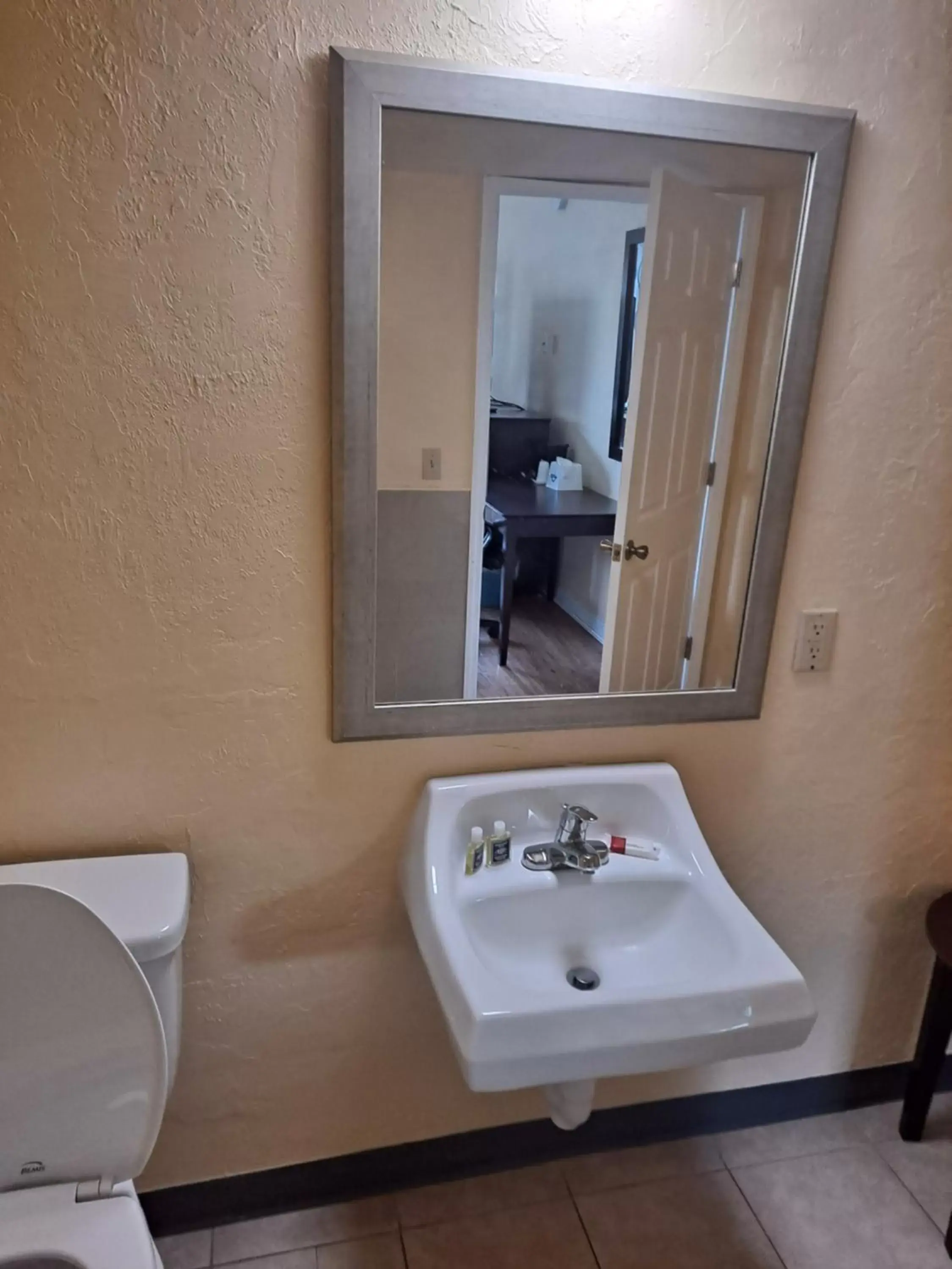 Bathroom in Days Inn by Wyndham Gainesville University