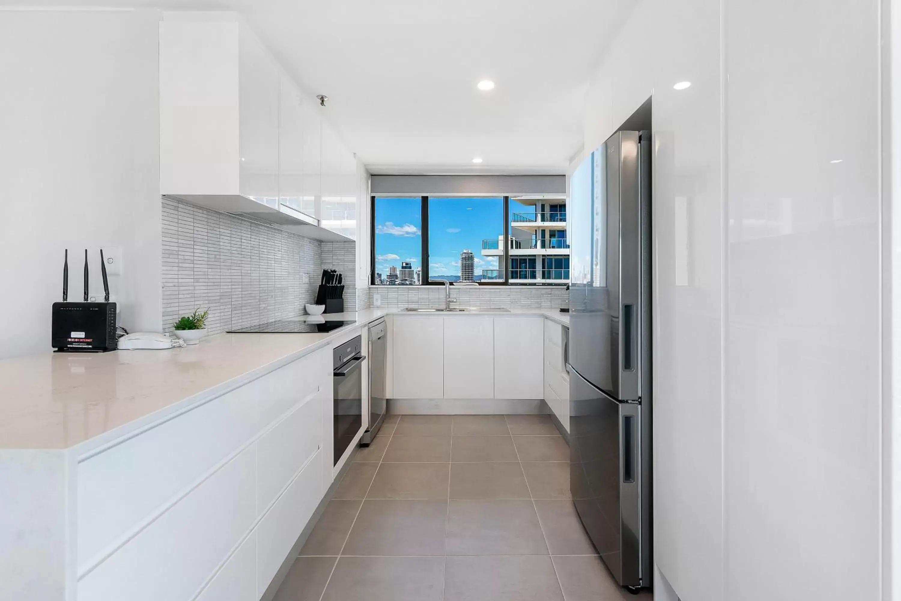 Kitchen/Kitchenette in Surfers Century Oceanside Apartments