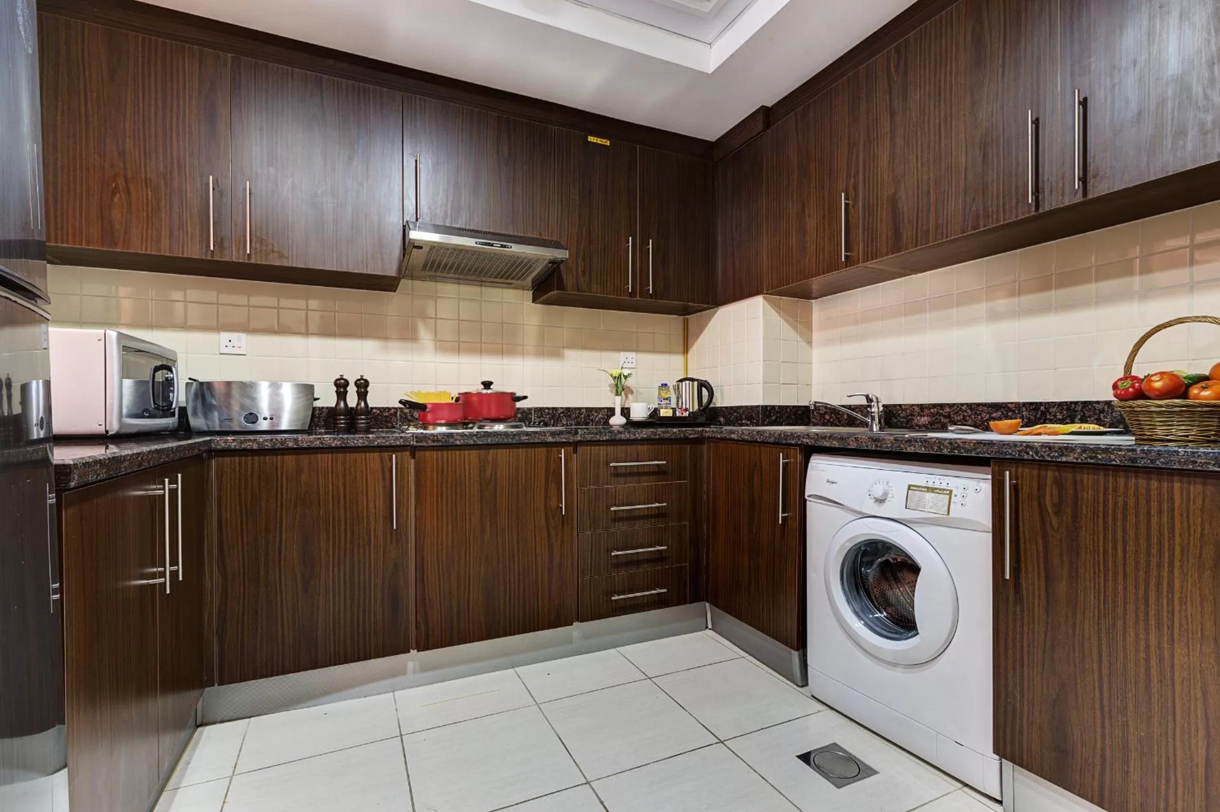 Kitchen or kitchenette in Abidos Hotel Apartment Dubai Land