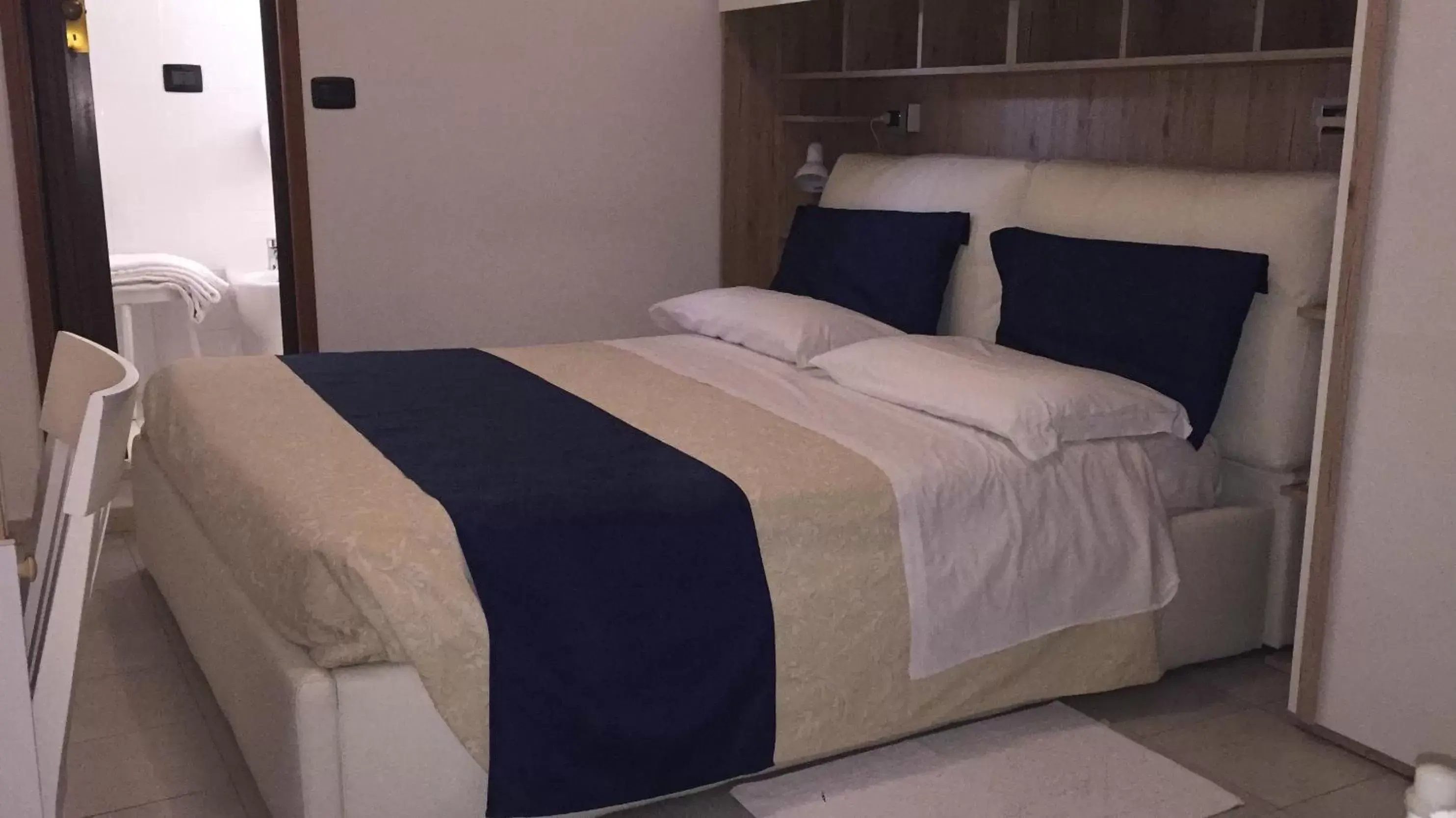 Bed in Dea Della Salute Hotel