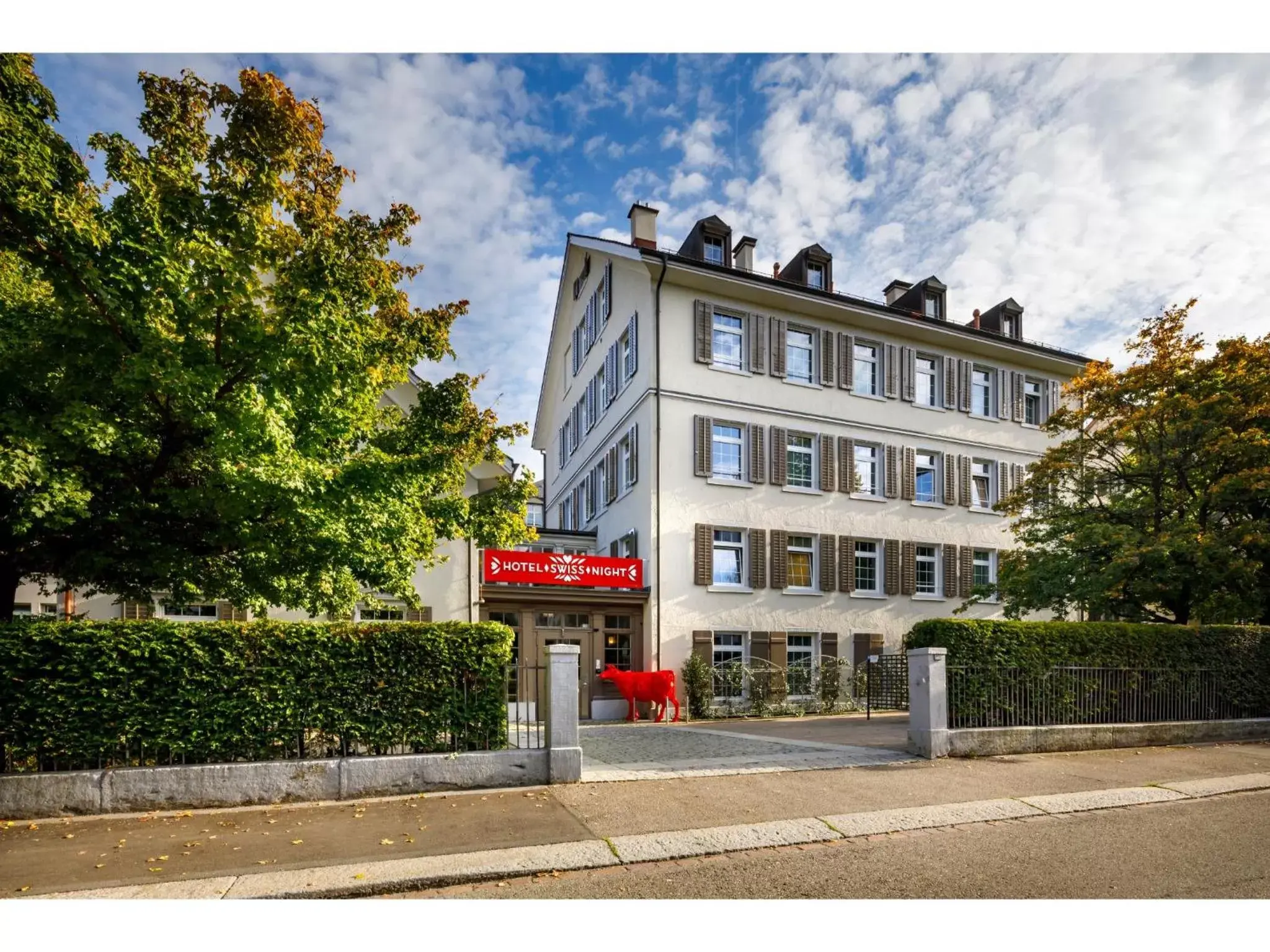 Facade/entrance, Property Building in Swiss Night by Fassbind