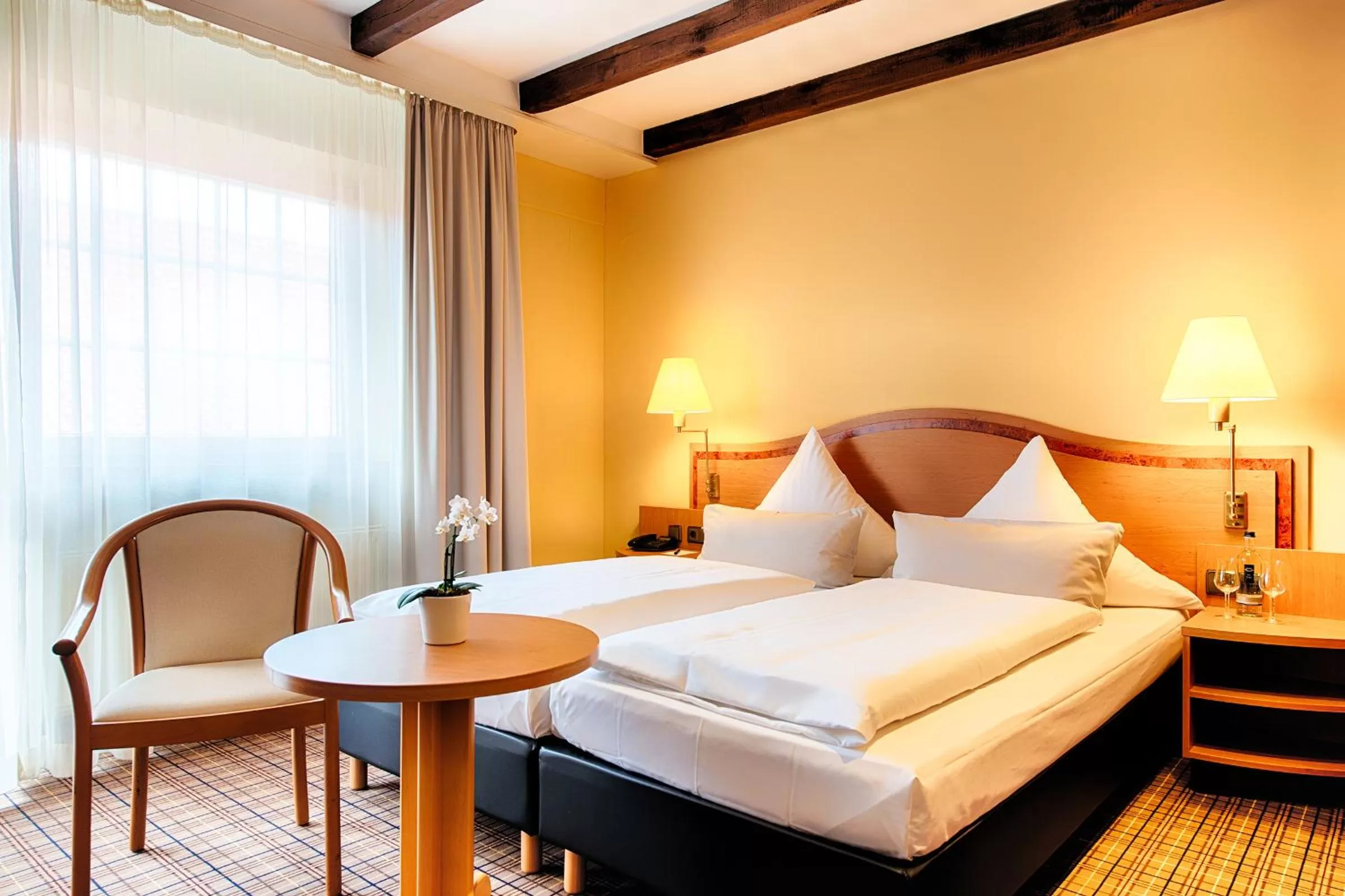 Bed in Welcome Hotel Legden