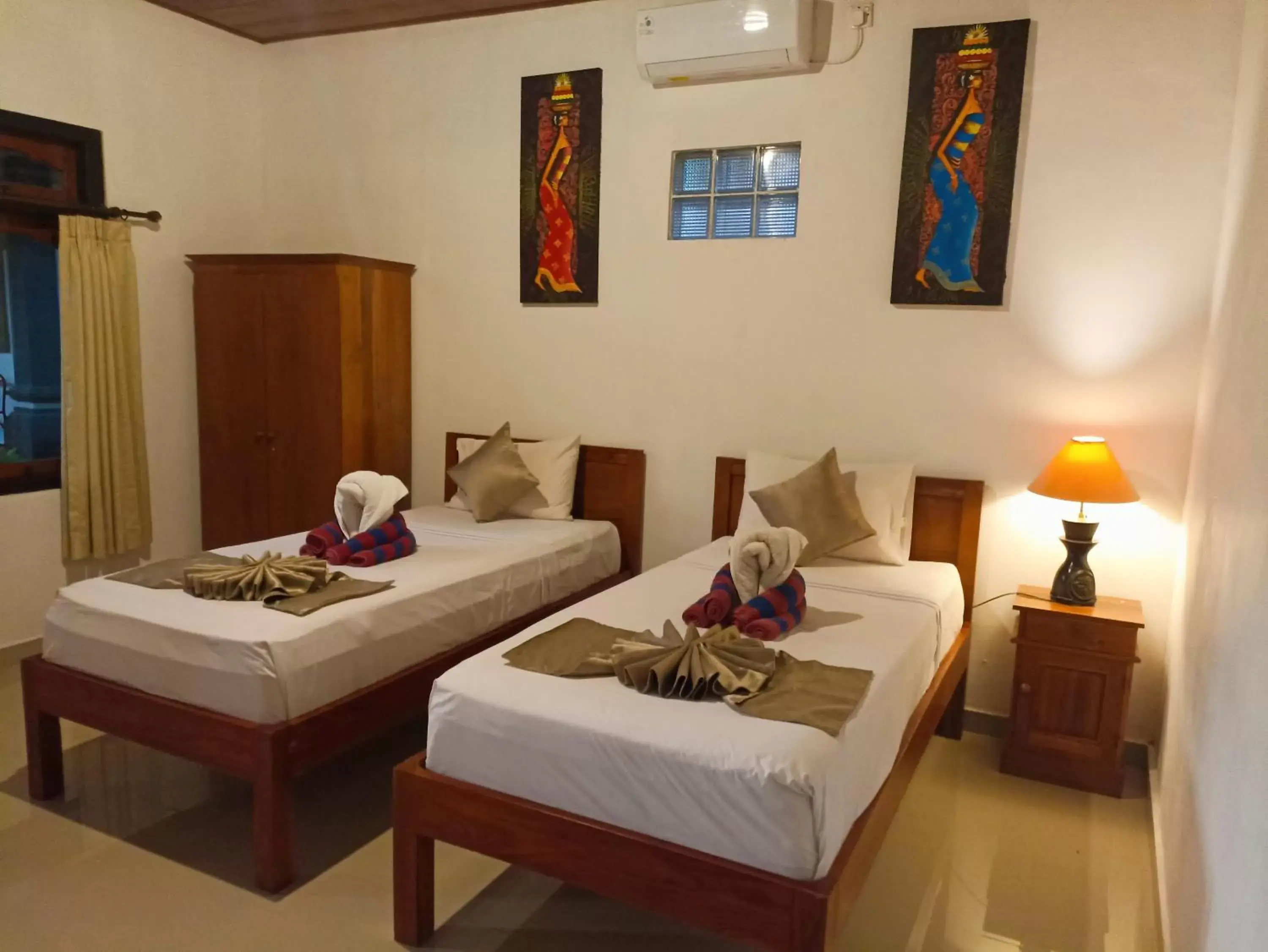 Bed in Kusnadi Hotel Bed in Kusnadi Hotel