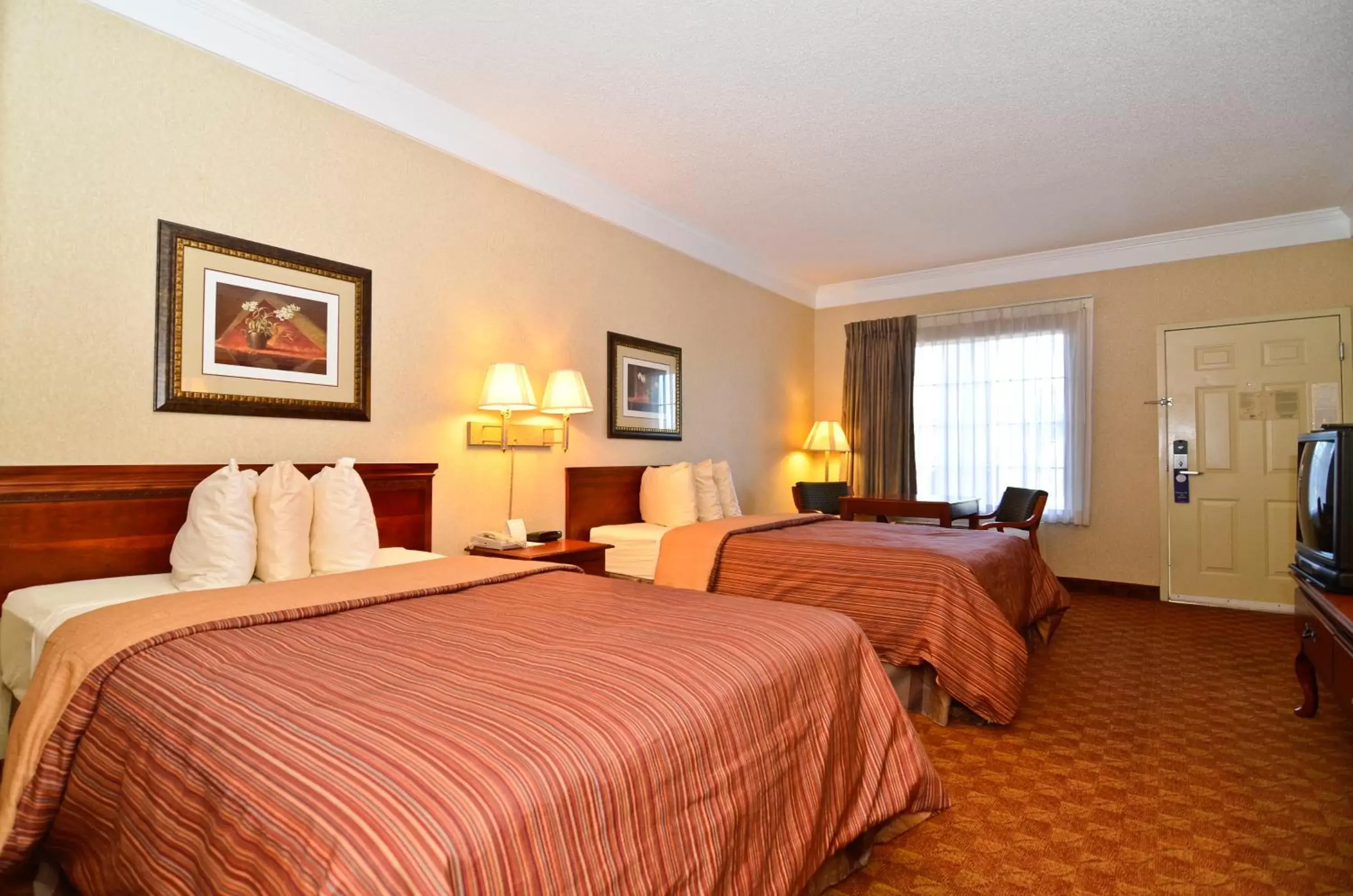 Photo of the whole room, Bed in Peach State Inn & Suites Photo of the whole room, Bed in Peach State Inn & Suites