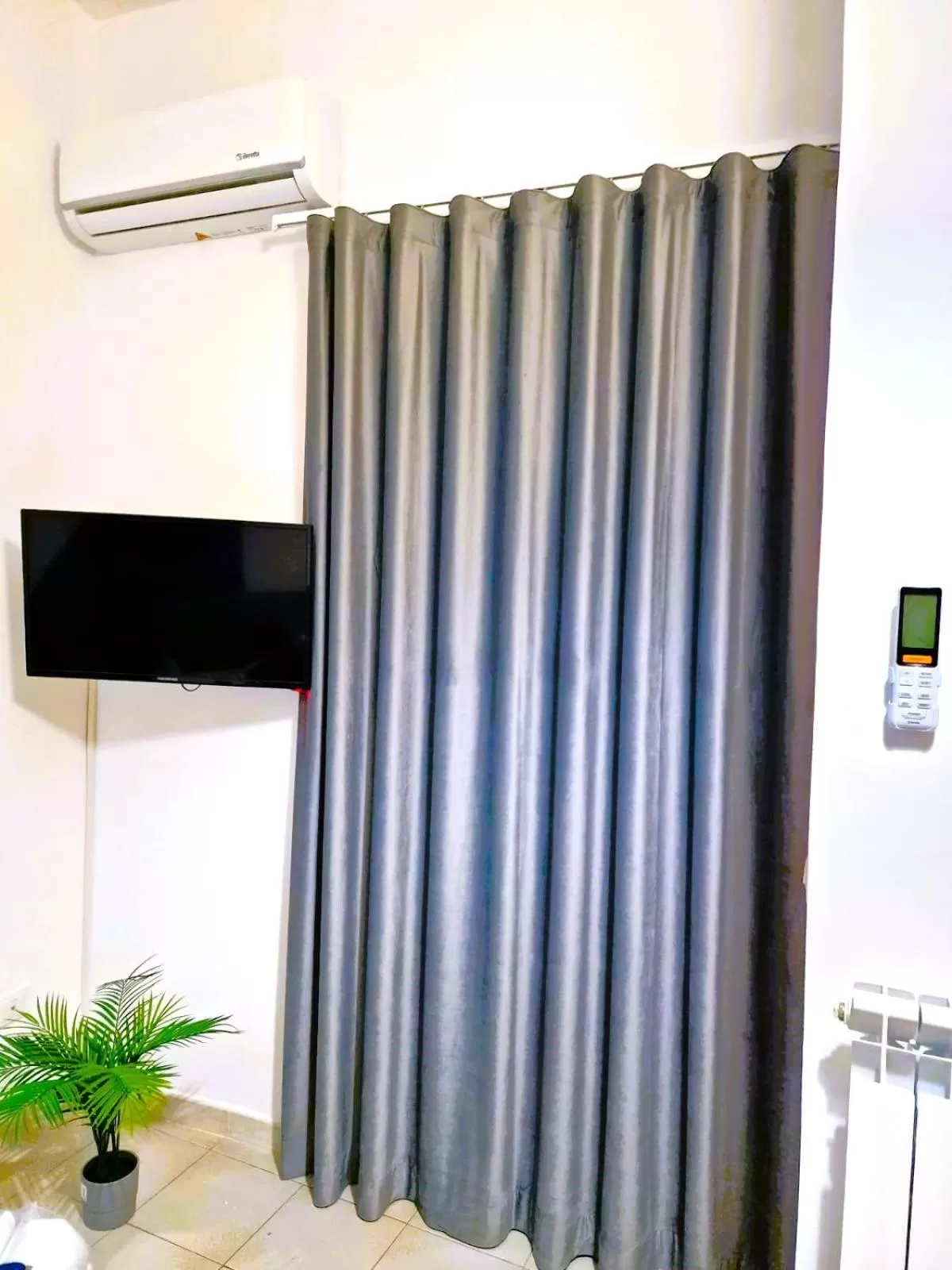 Bedroom, TV/Entertainment Center in B&B ONE