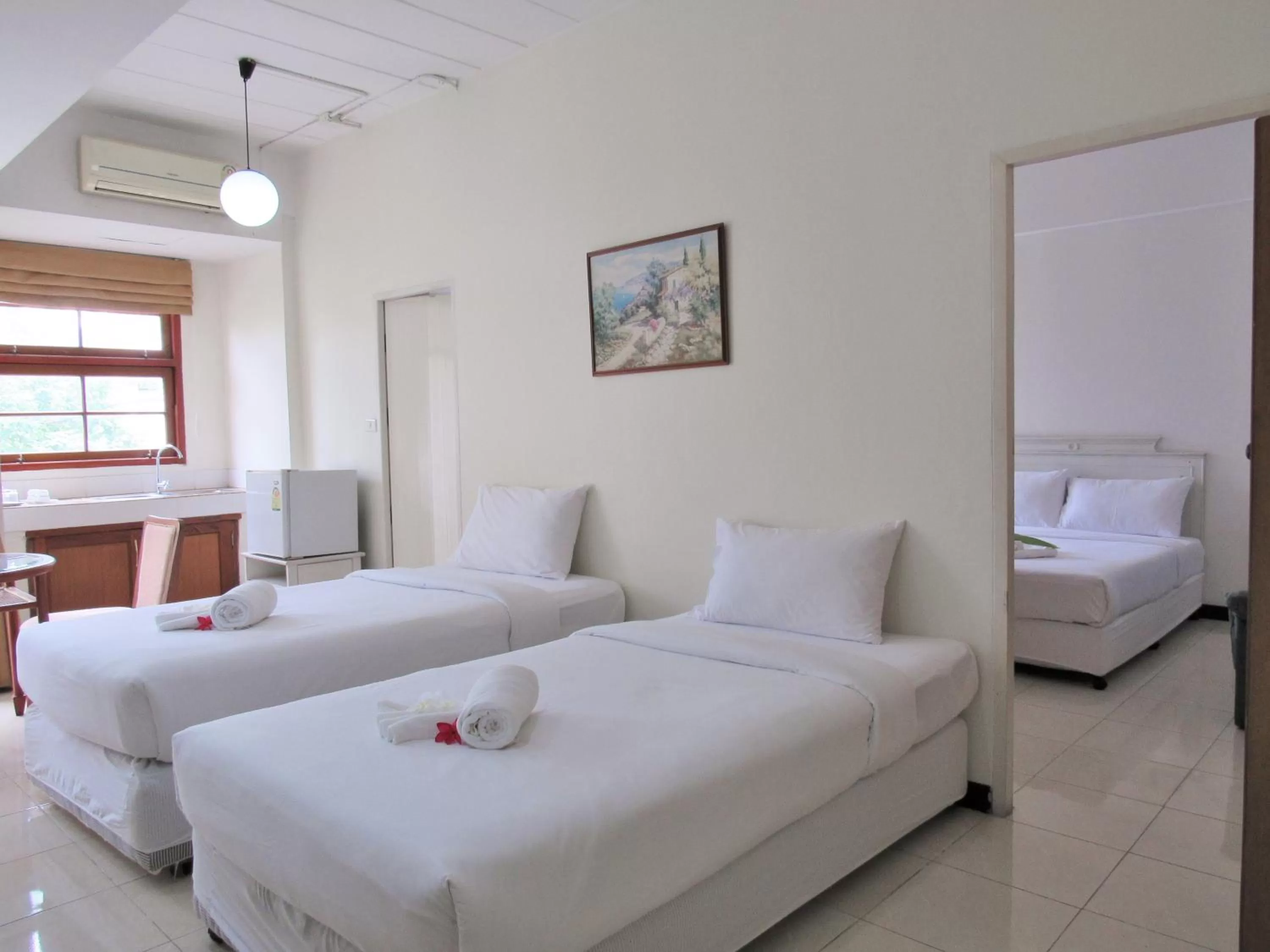 Photo of the whole room, Bed in JL Bangkok Hotel