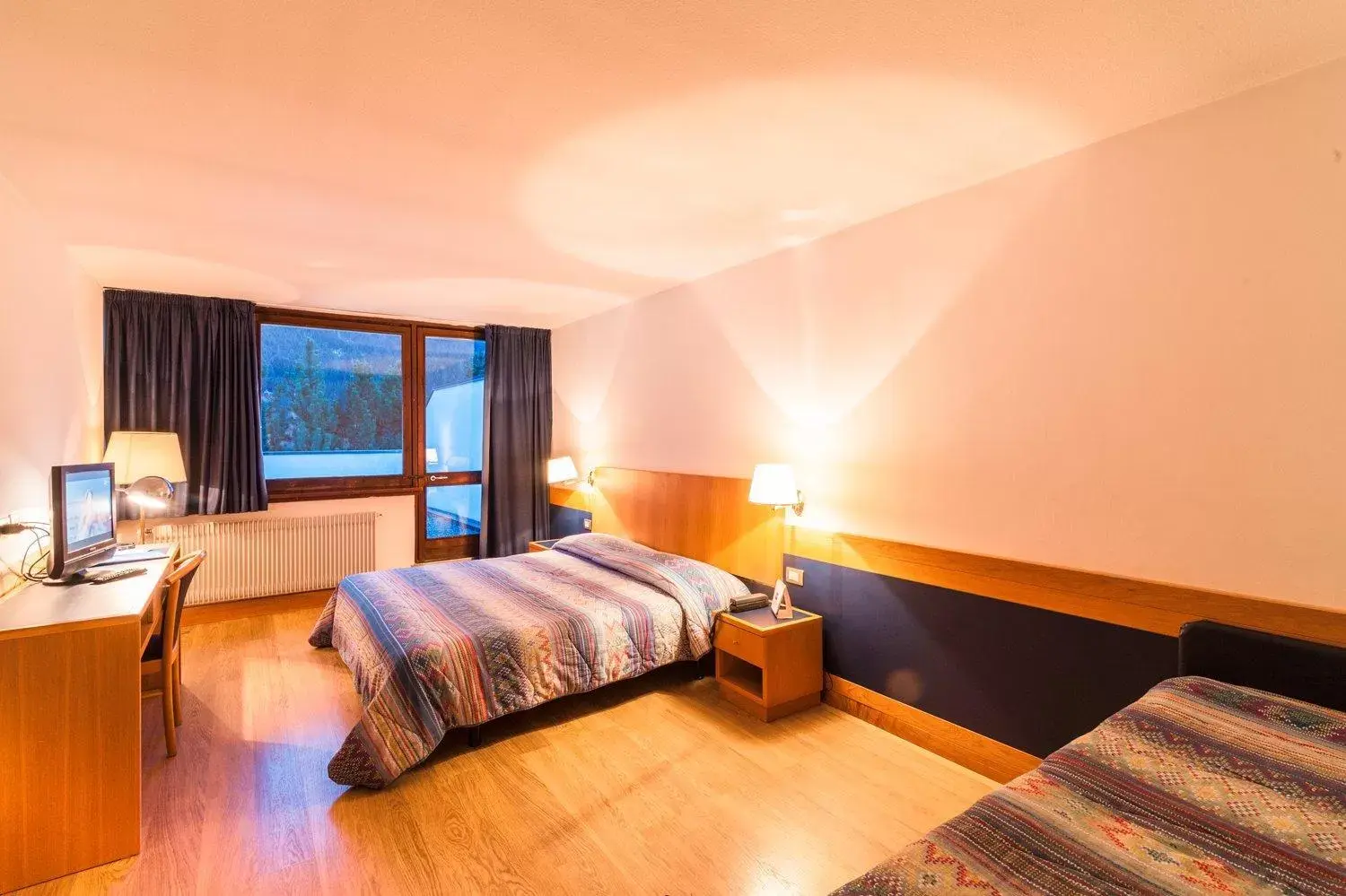 Photo of the whole room, Bed in Hotel Club Regina E Fassa