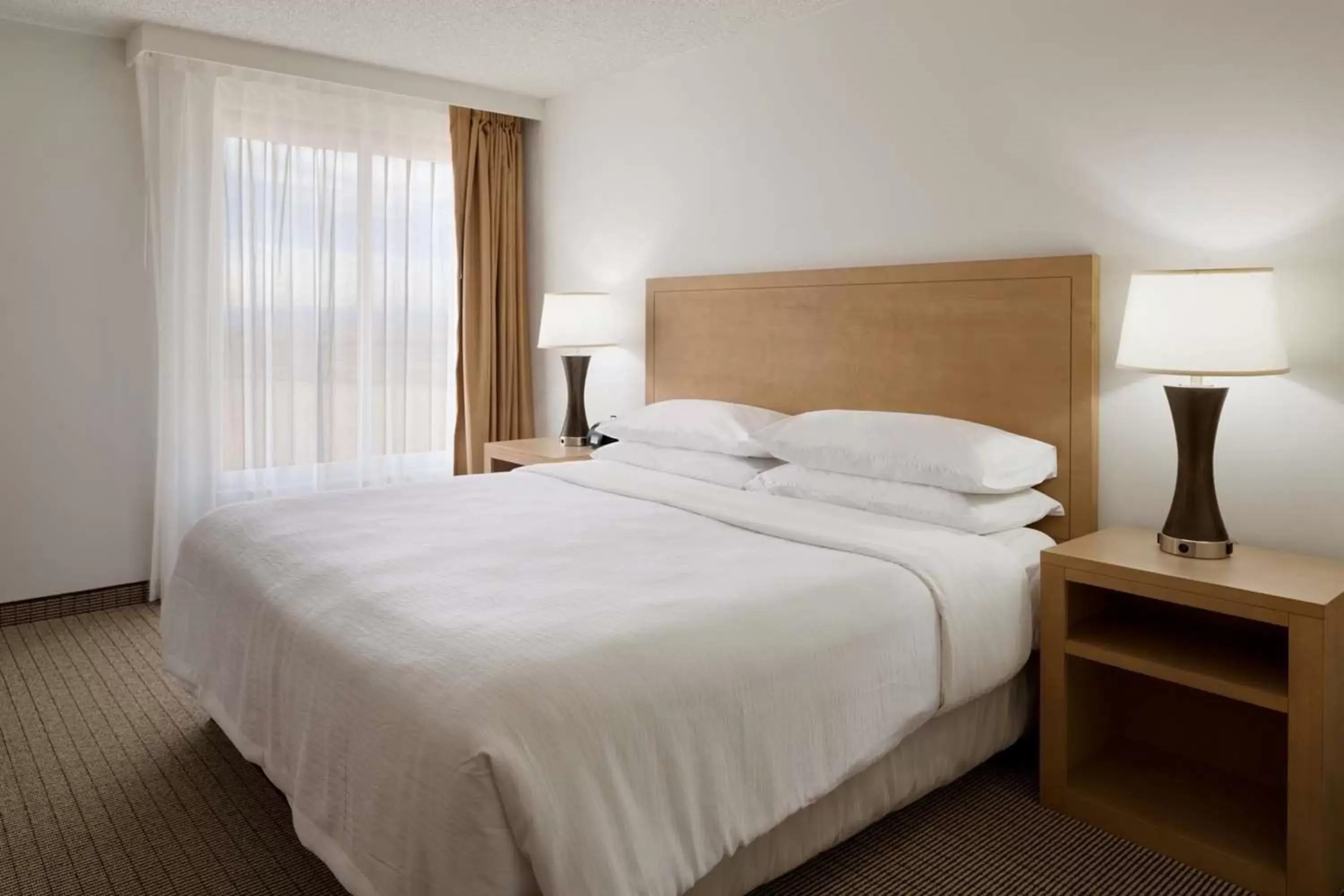 Bed in Embassy Suites by Hilton Denver International Airport