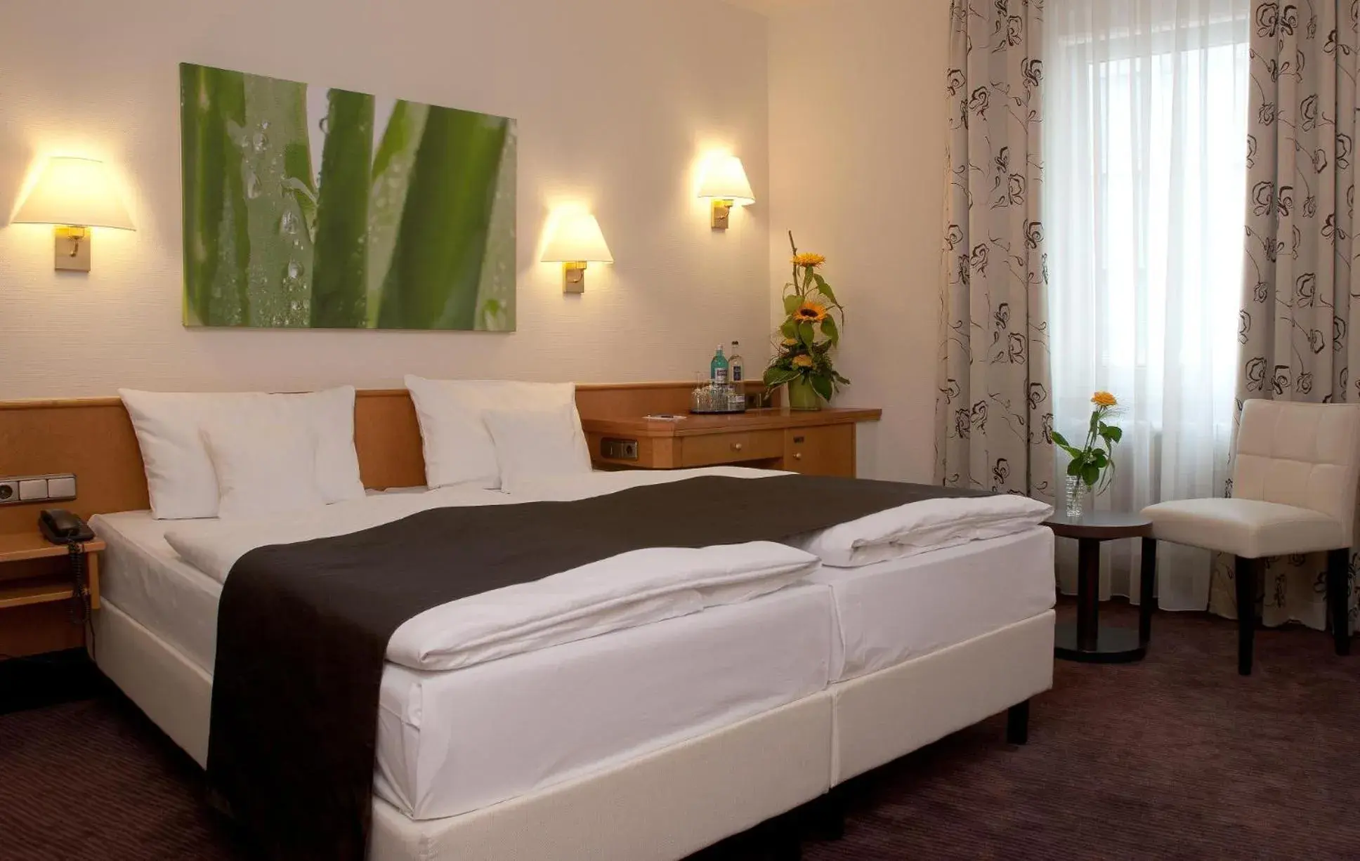 Bed in The Domicil Hotel Frankfurt City