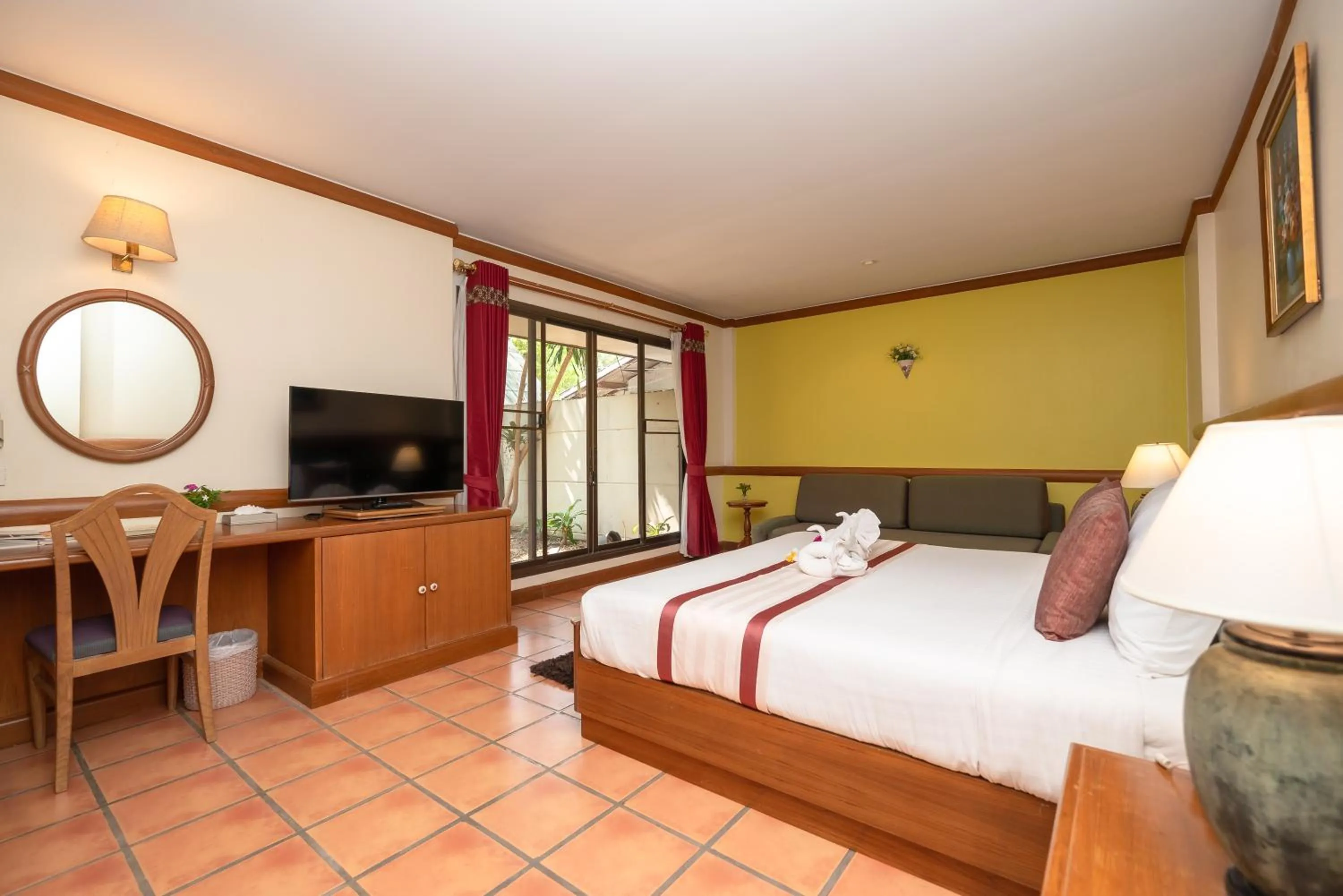 Bed in Comsaed River Kwai Resort