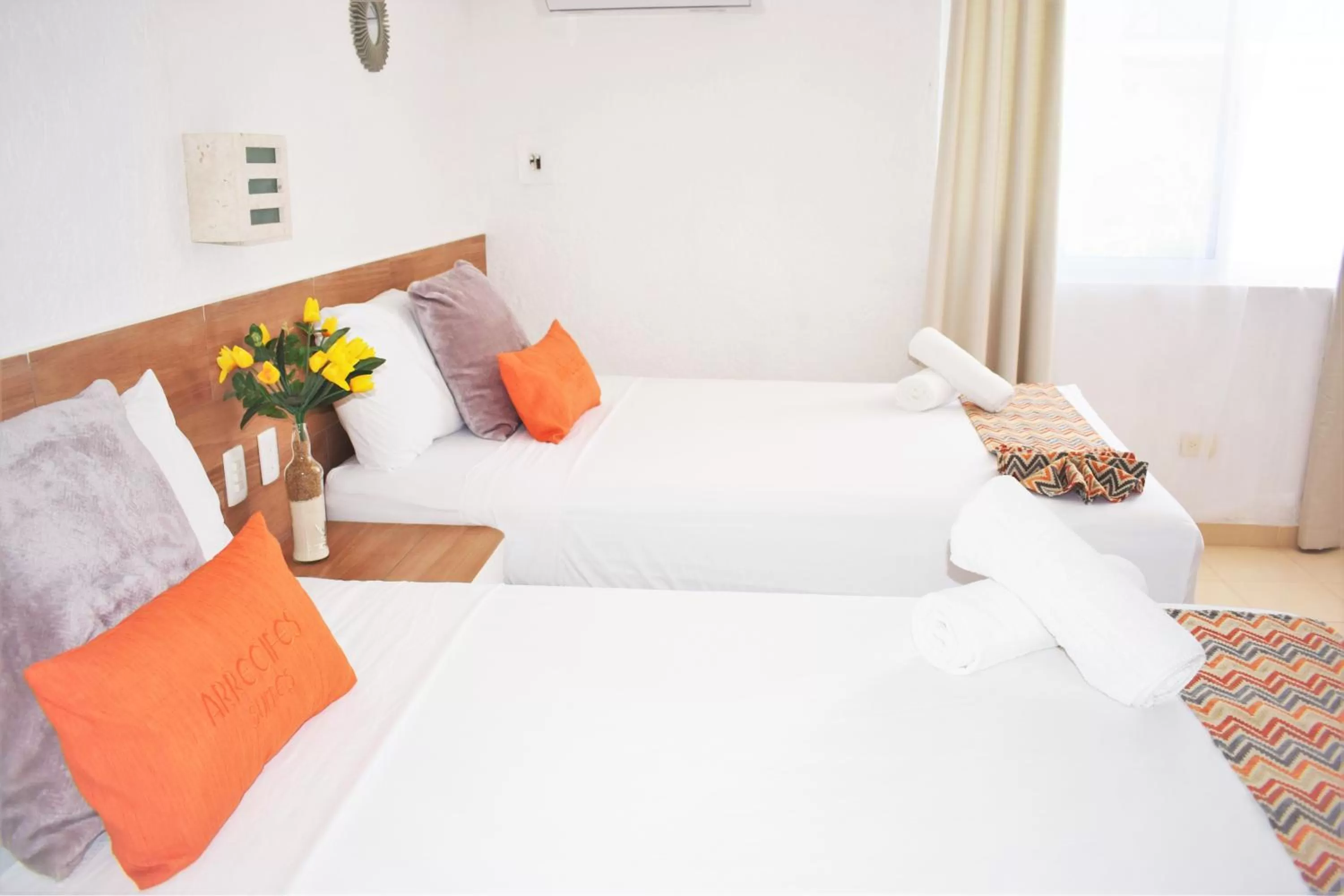 Bed in Arrecifes Suites